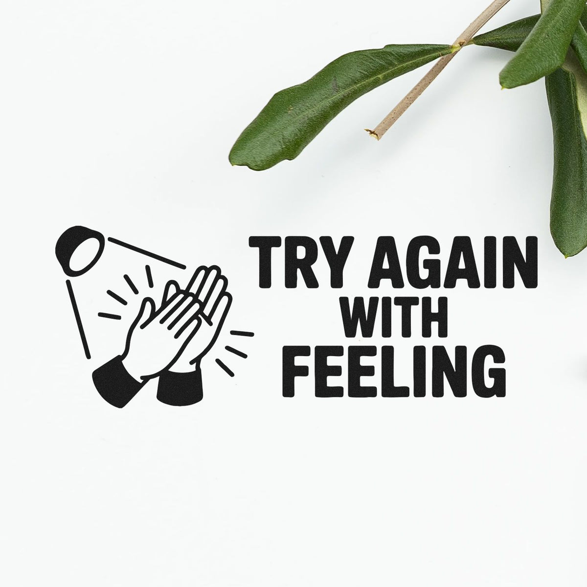 Custom rubber stamp design with clapping hands icon and Try Again With Feeling text for humorous office or craft use.