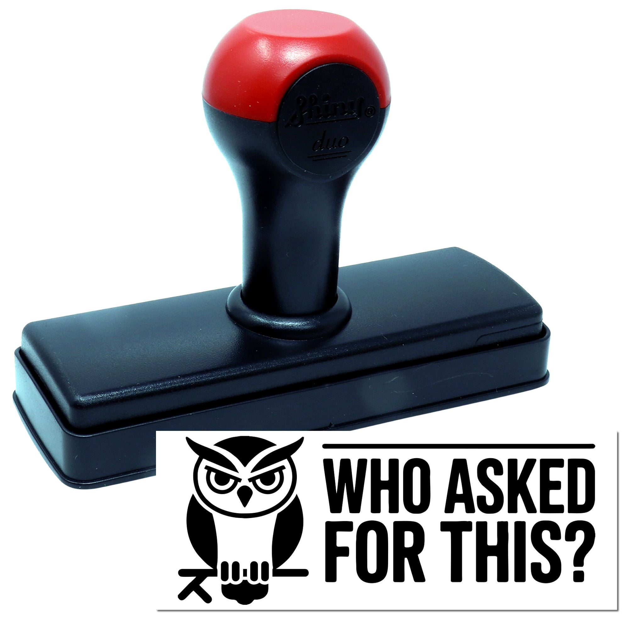 Self-inking rubber stamp with owl graphic and Who asked for this? text for novelty office or teacher use.