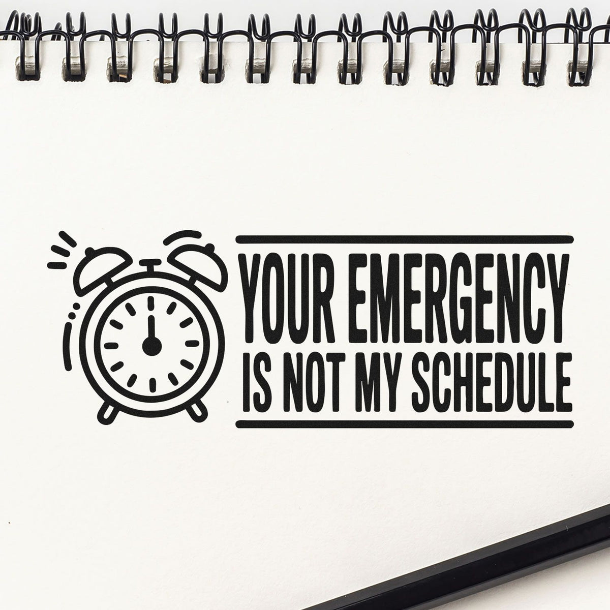 Rubber stamp design with alarm clock icon and bold quote, Your Emergency Is Not My Schedule, for office or planner use.