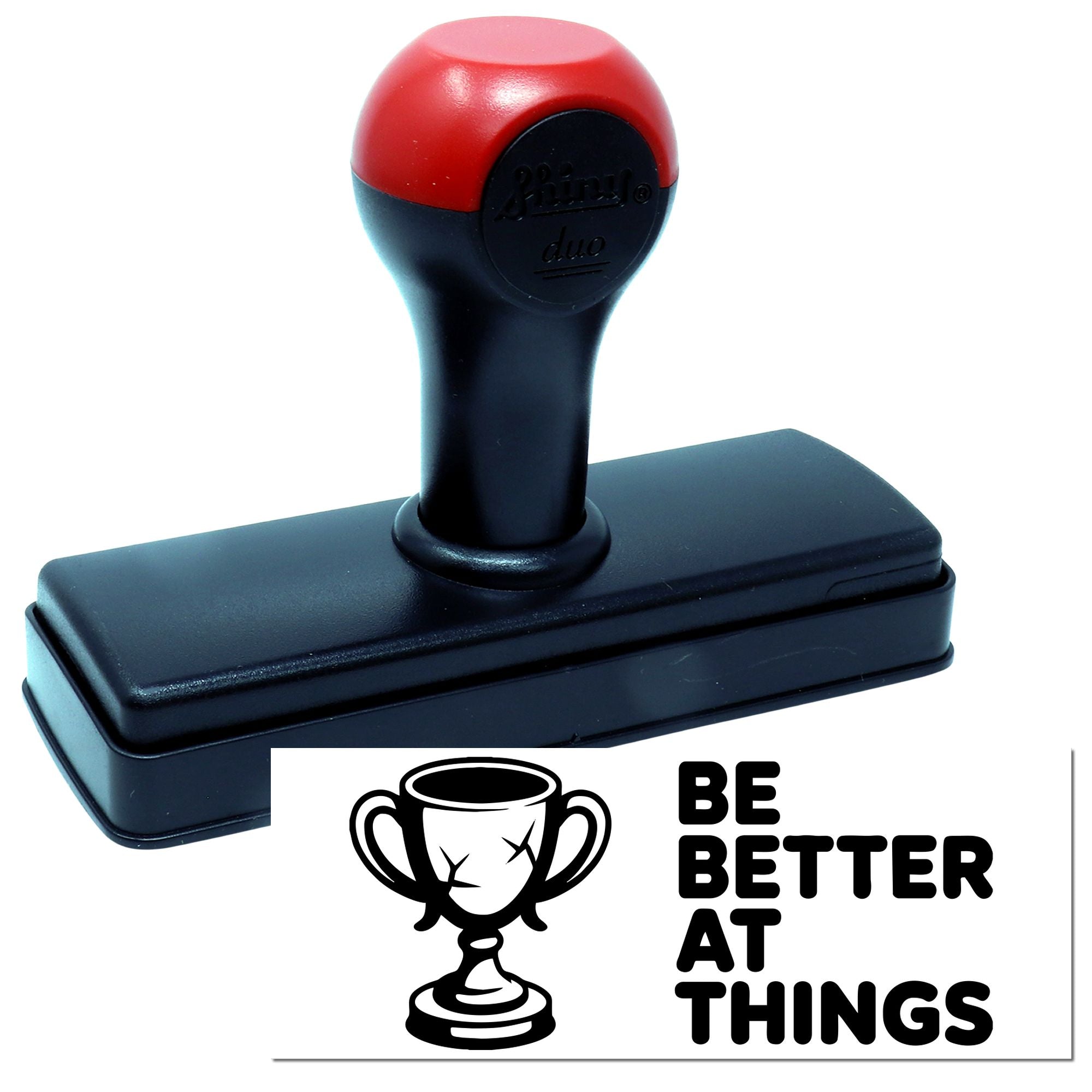 Self-inking rubber stamp with trophy design and Be Better at Things imprint for motivational office branding
