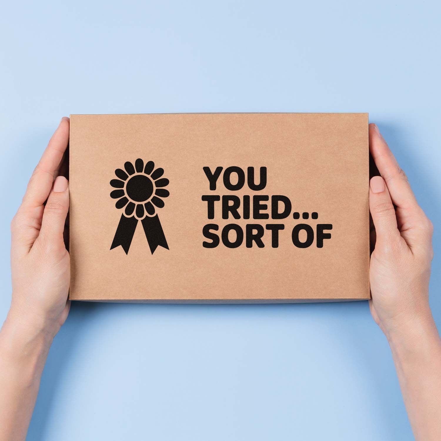 Funny rubber stamp design on kraft box with award ribbon icon and You Tried... Sort Of text.