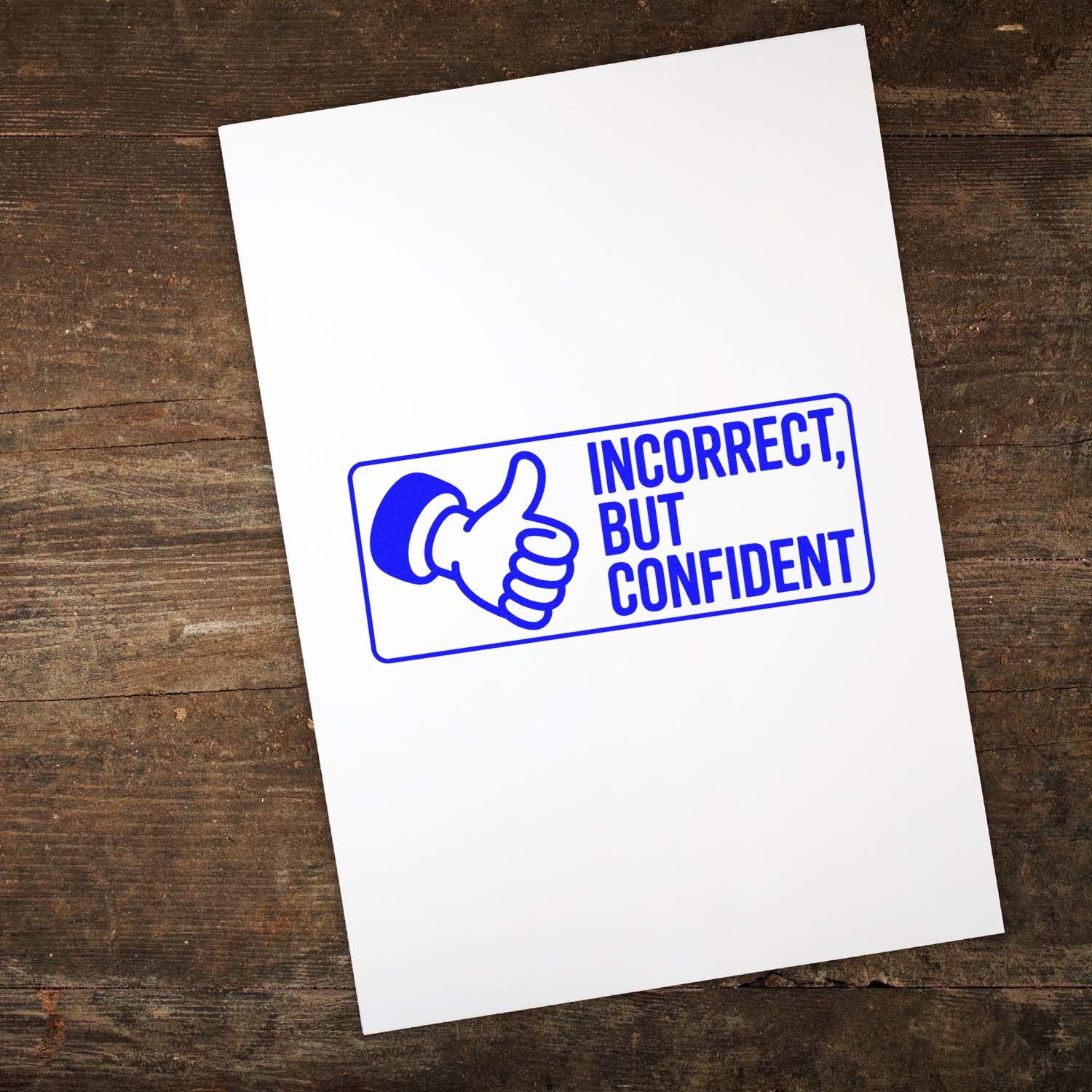 Blue rubber stamp design with thumbs-up icon and Incorrect, but confident text on white paper.