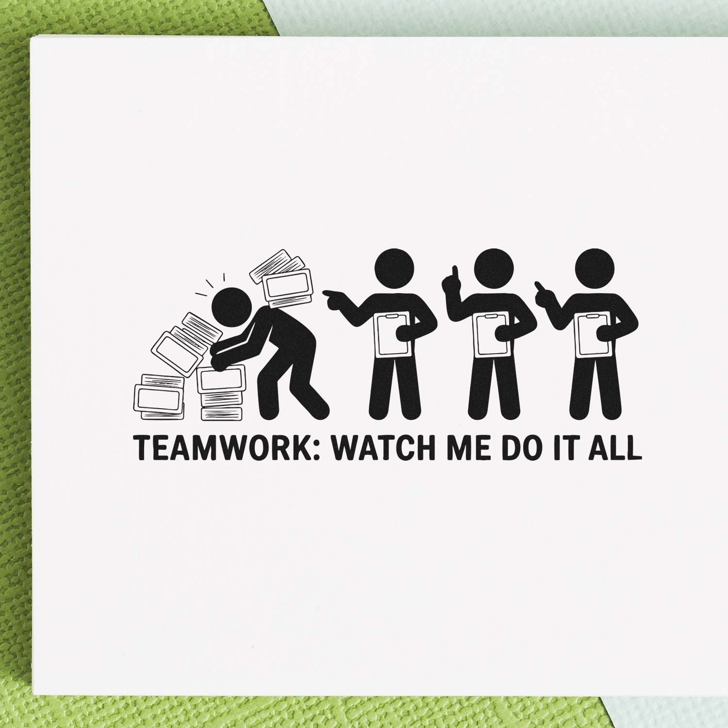 Humorous office rubber stamp saying Teamwork: Watch Me Do It All for overworked employees and delegation jokes.