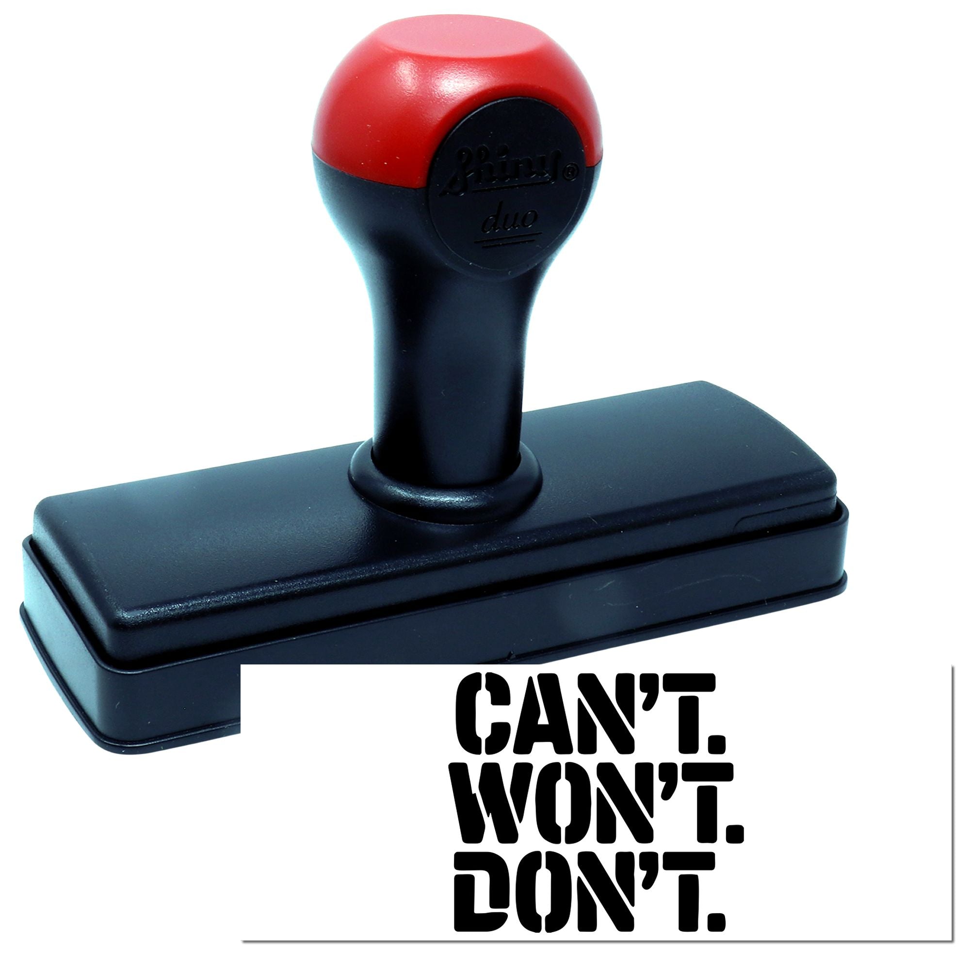 Self-inking rubber stamp with bold CANT WONT DONT imprint for motivational office or craft use.