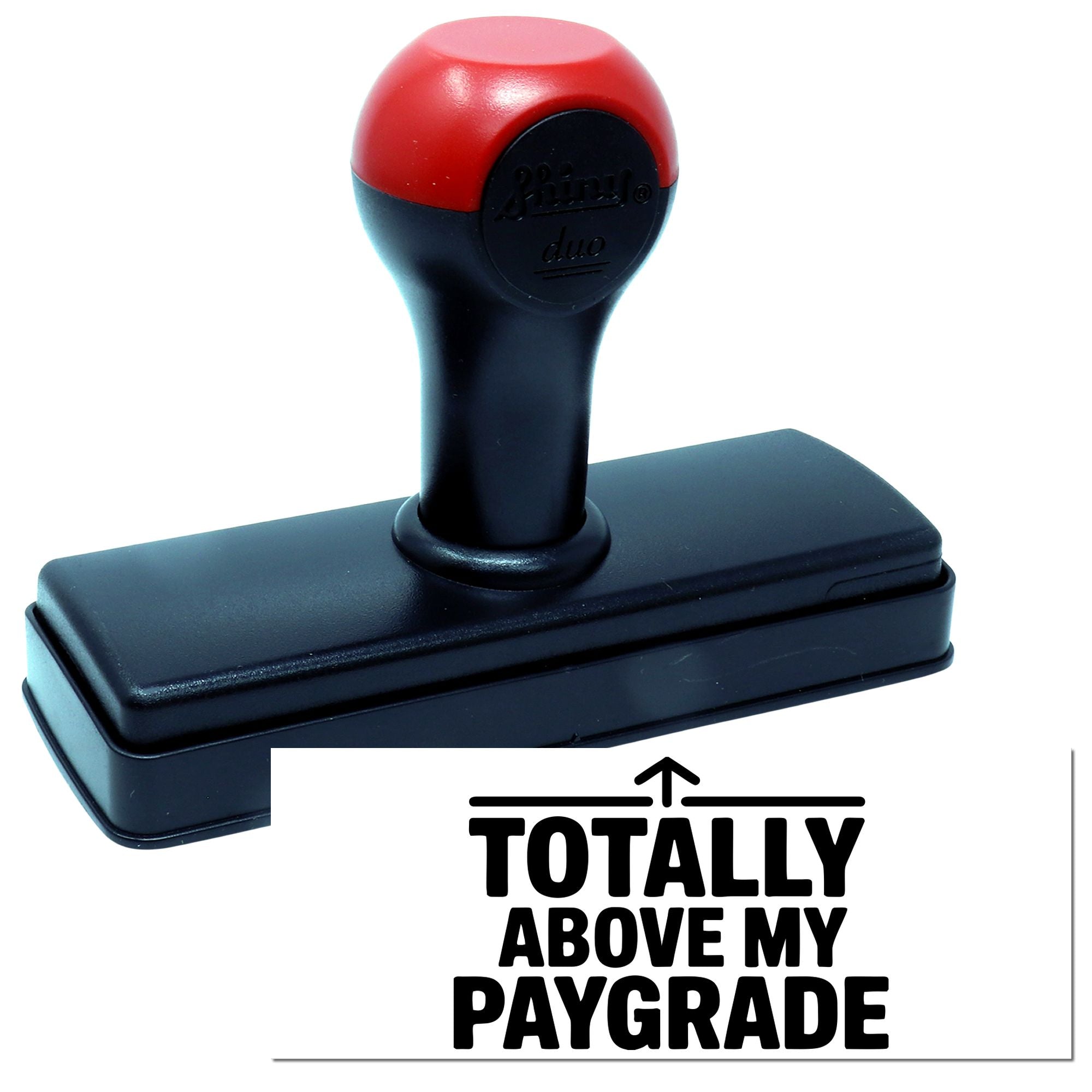 Self-inking rubber stamp with Totally Above My Paygrade imprint for office humor and document marking.