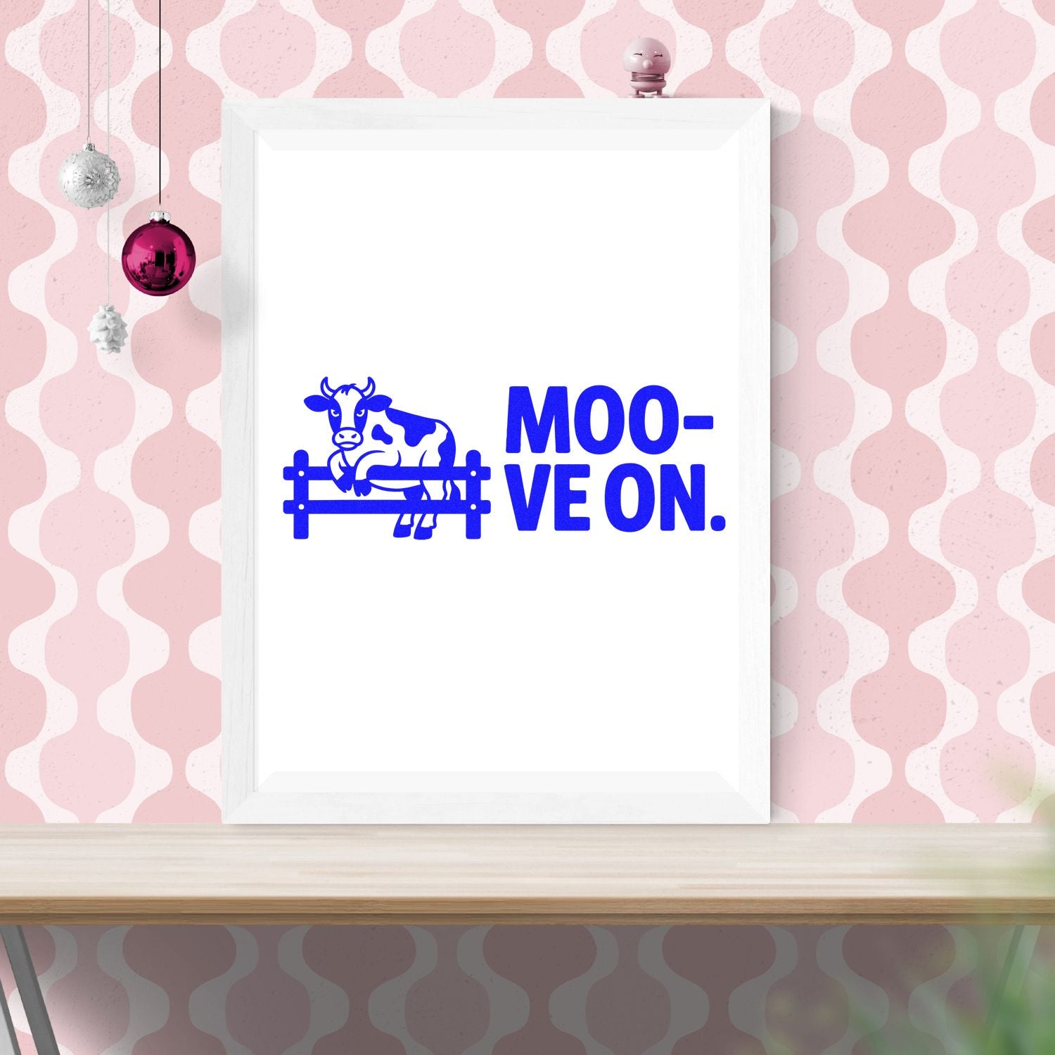 Blue Moo-ve On cow rubber stamp design with cow on fence, shown as a framed wall art mockup.
