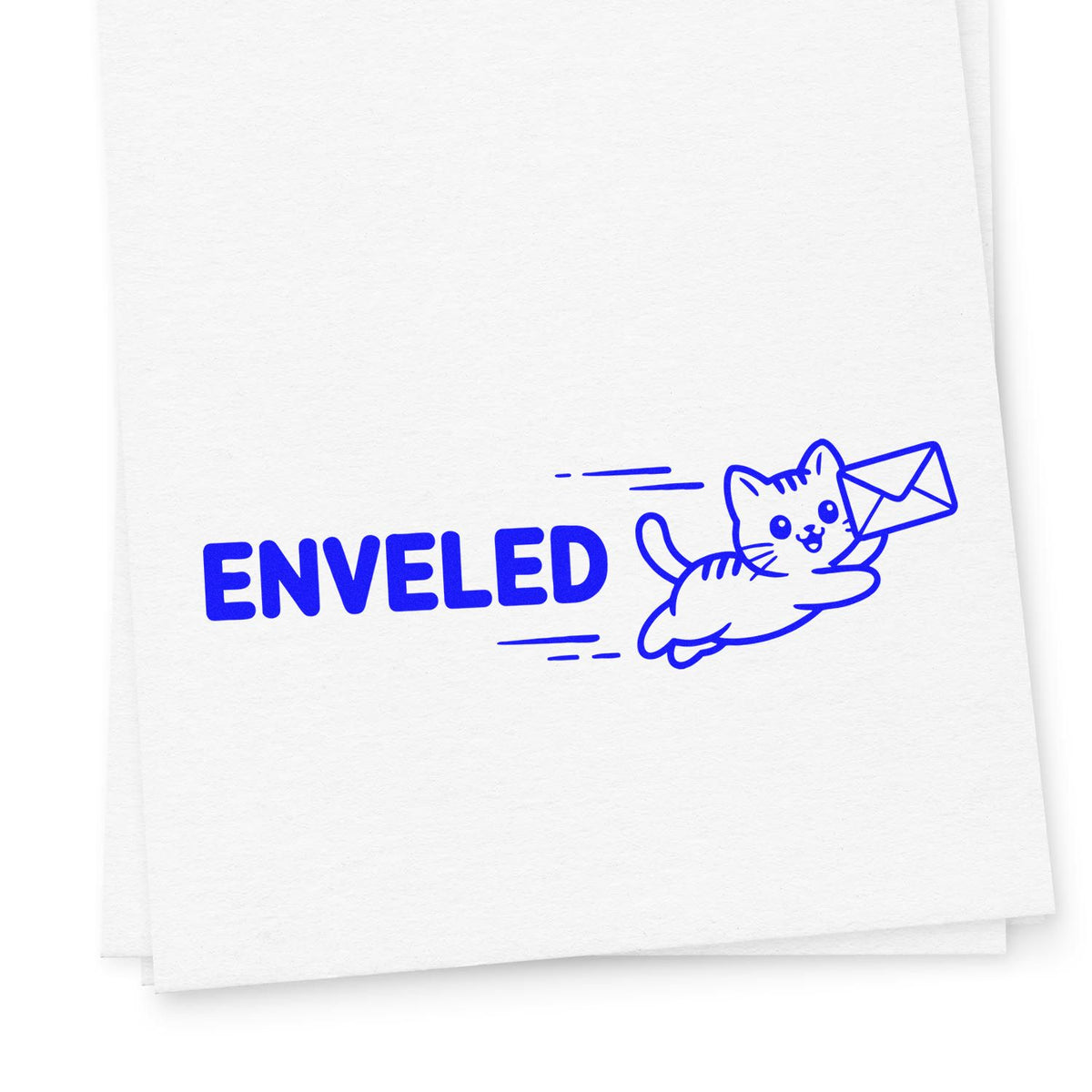 Blue cat mailing rubber stamp with envelope, reading ENVELED on white paper.