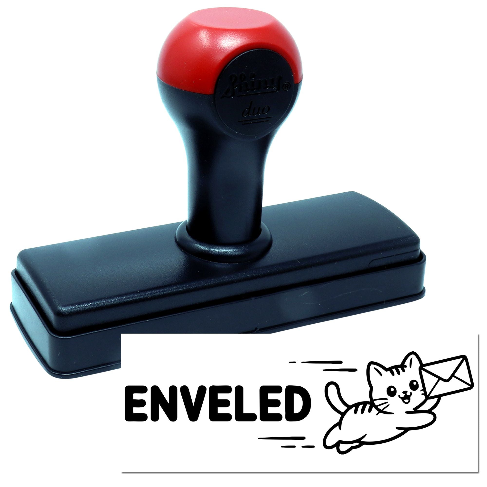 Self-inking rubber stamp with custom Enveled cat-and-envelope design for mail and packaging marking.