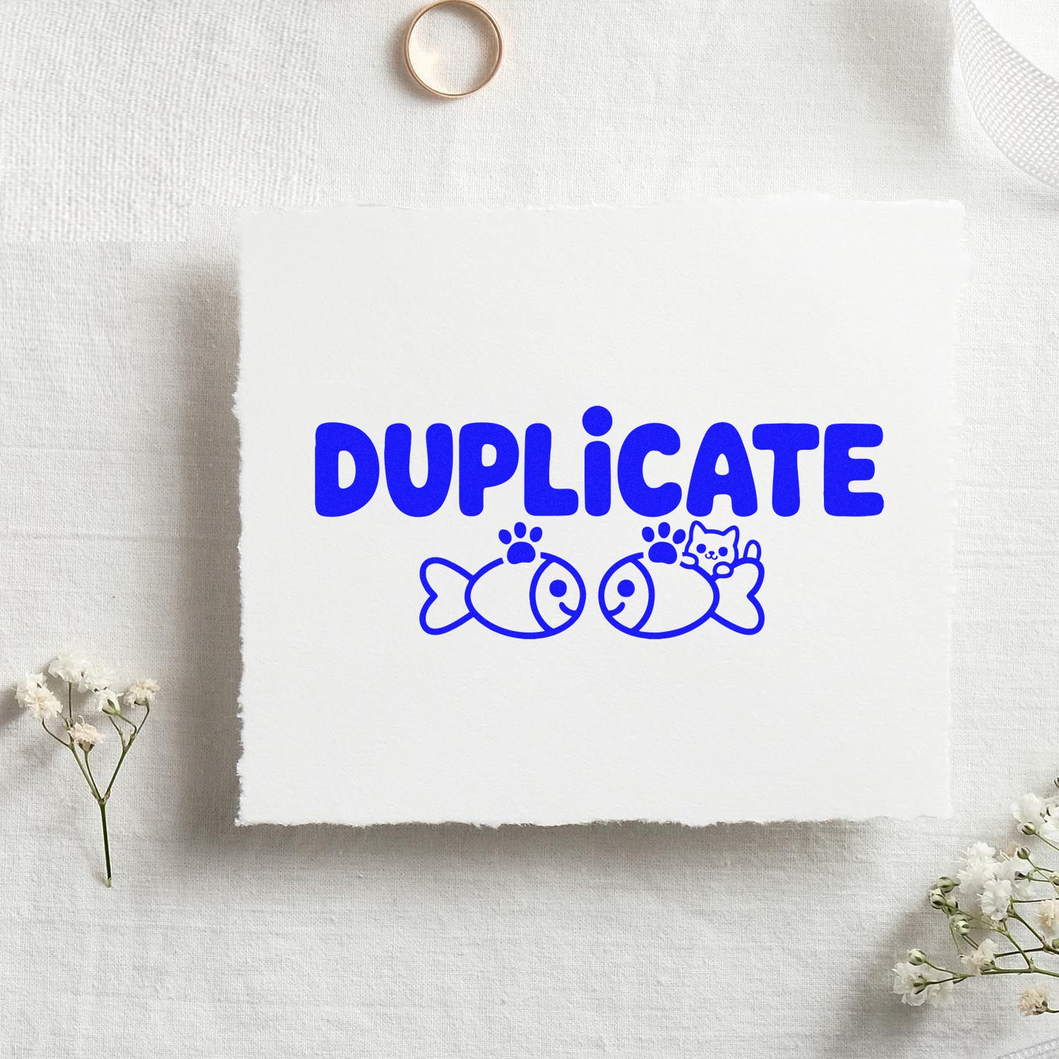 Duplicate rubber stamp with playful fish and cat design for labeling copies on office documents