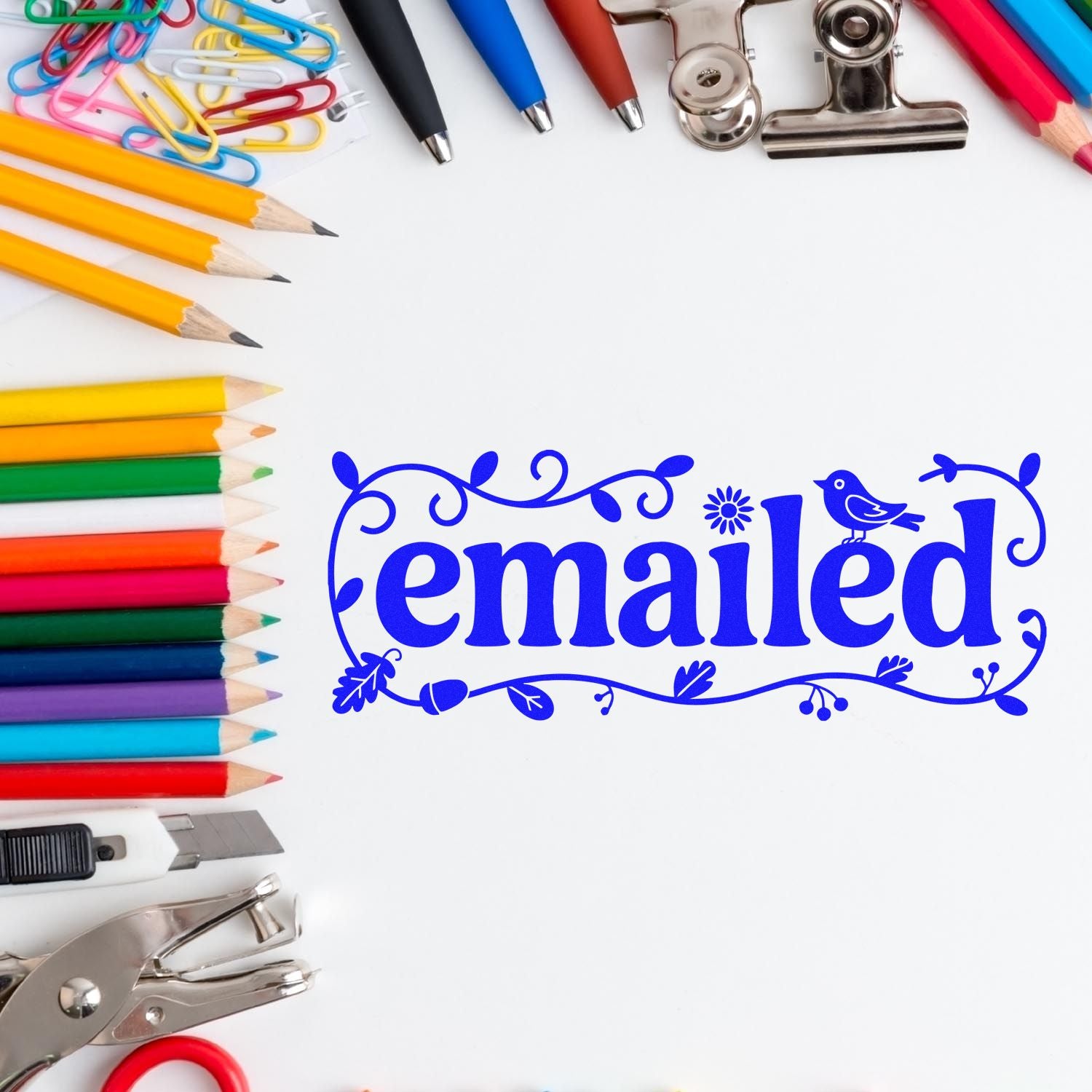 Decorative blue emailed rubber stamp on stationery background for office document processing.
