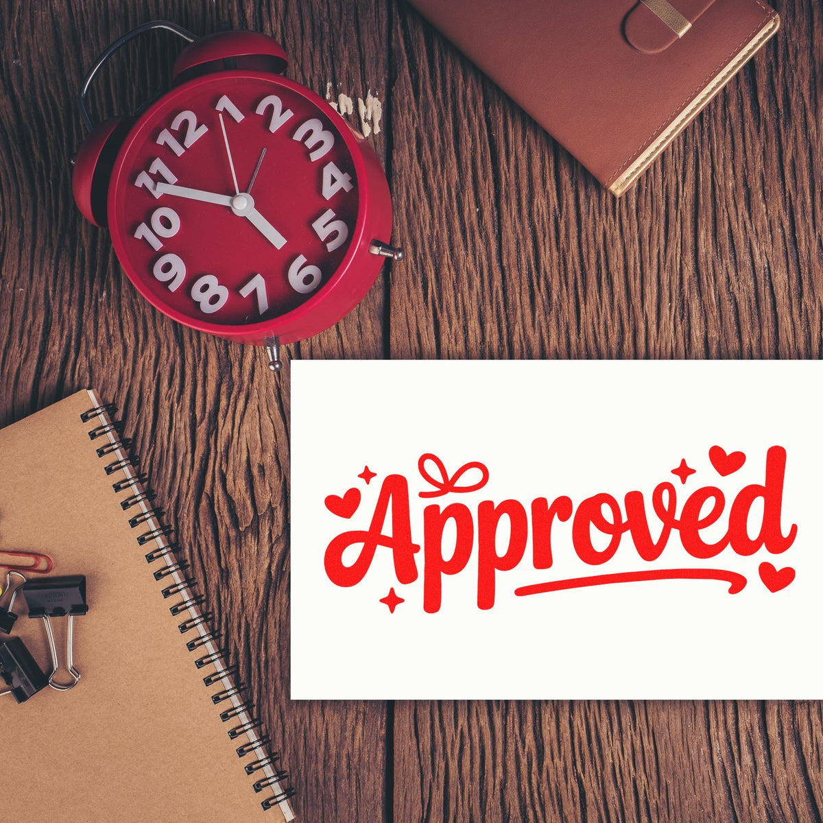 Red approved rubber stamp design on office desk with clock and notebook, perfect for business approval and office branding.