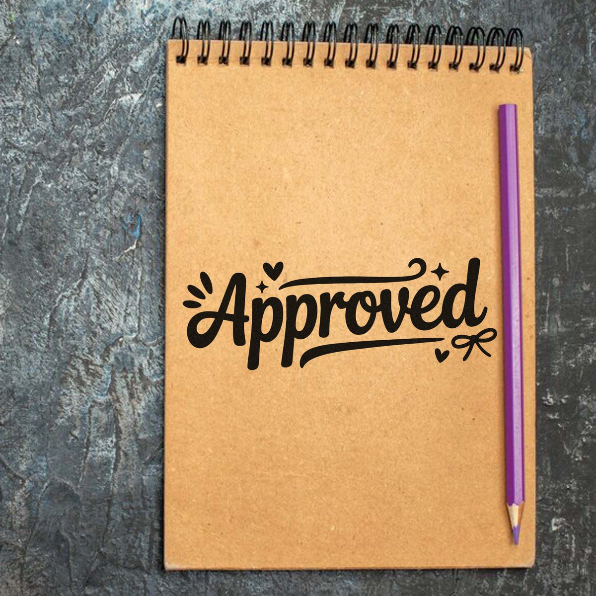 Approved rubber stamp design on a notebook, ideal for school, office, and planner stamping supplies.