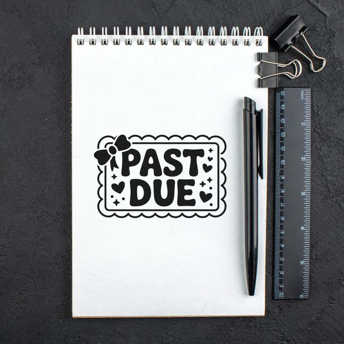 Past Due rubber stamp mockup on notebook for overdue billing, payment reminders, and office organization.