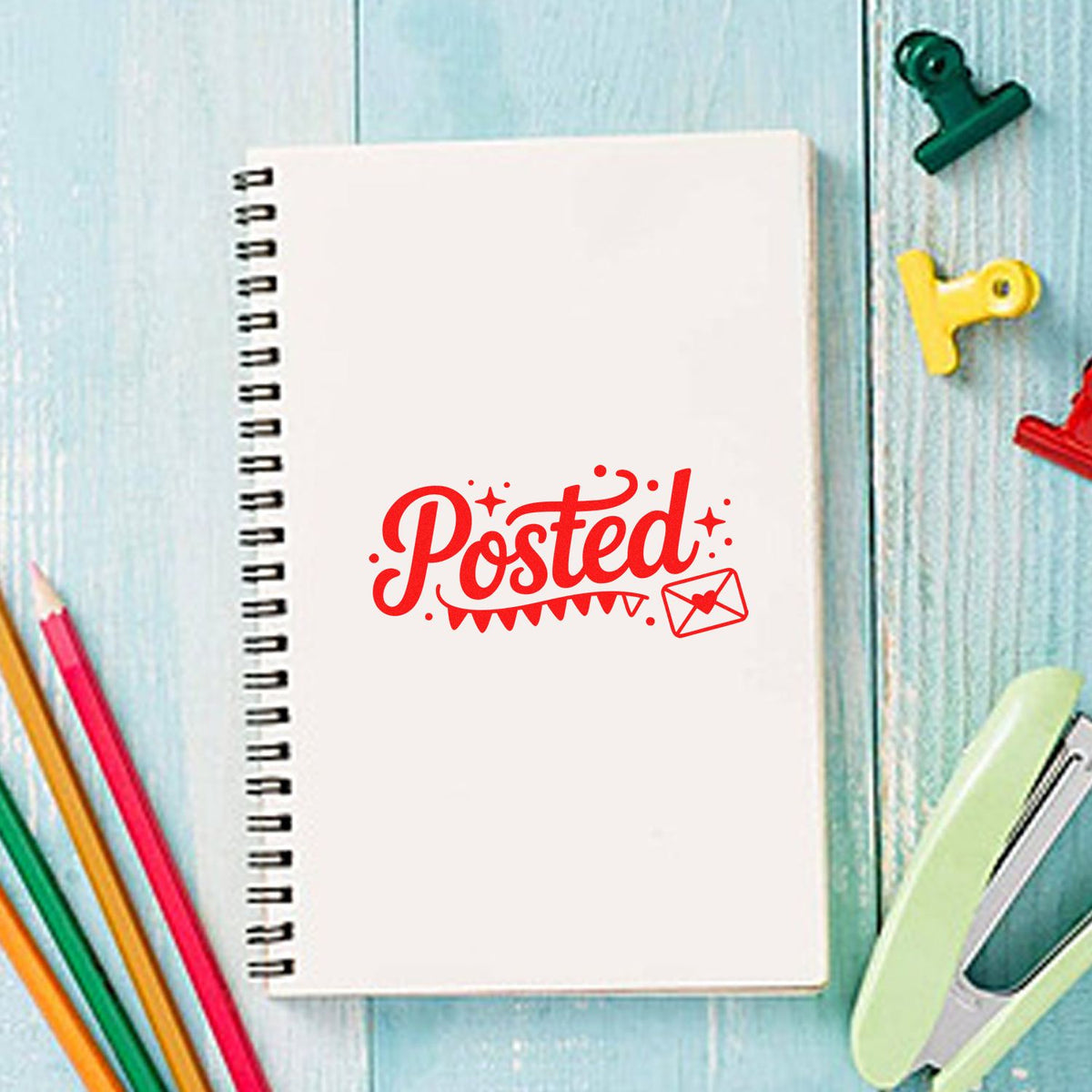 Red Posted rubber stamp on notebook, perfect for mailing, planners, scrapbooking, and stationery organization.