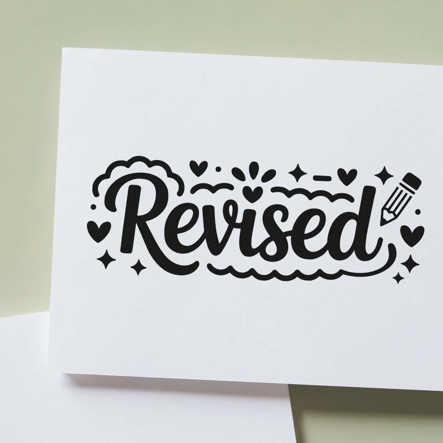 Decorative Revised rubber stamp design with hearts, stars and pencil icon on white paper