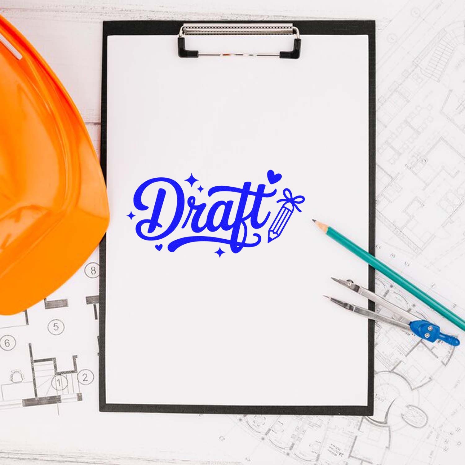 Draft rubber stamp on clipboard with construction blueprints, pencils, and hard hat for plan review.