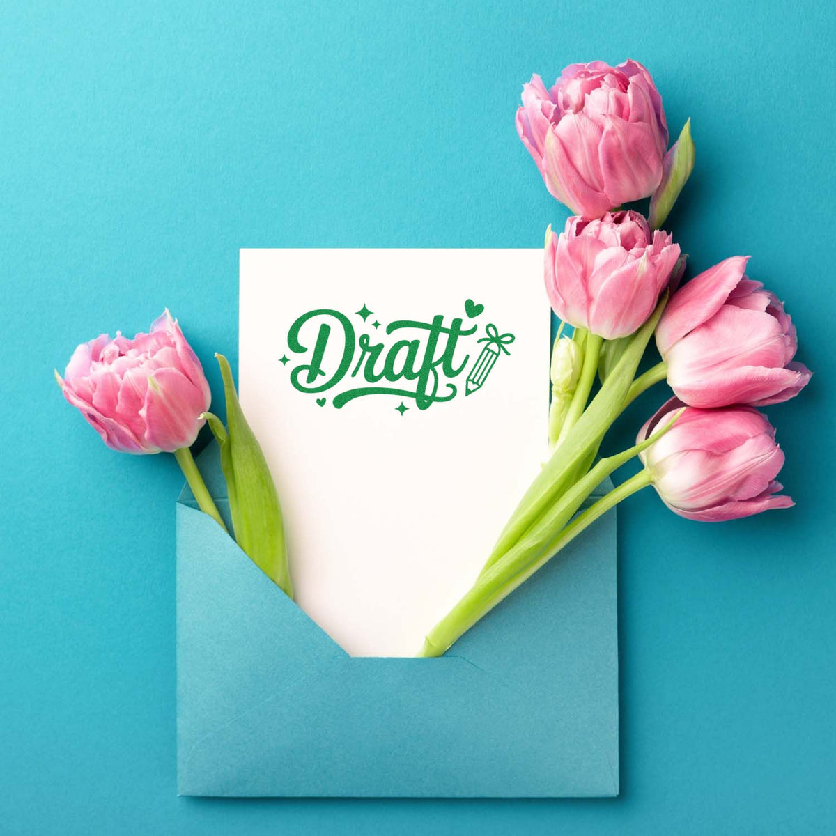 Draft rubber stamp design on a floral greeting card with pink tulips, perfect for handmade stationery and paper crafts.