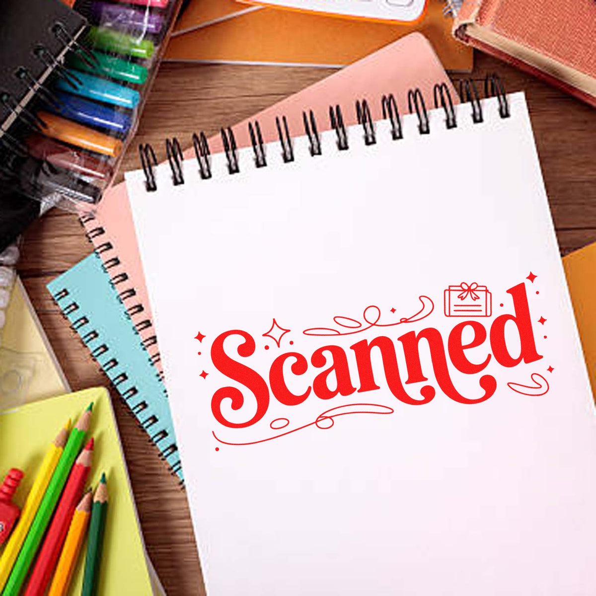 Red Scanned rubber stamp graphic on a notebook page with stationery, ideal for document approval or office use.