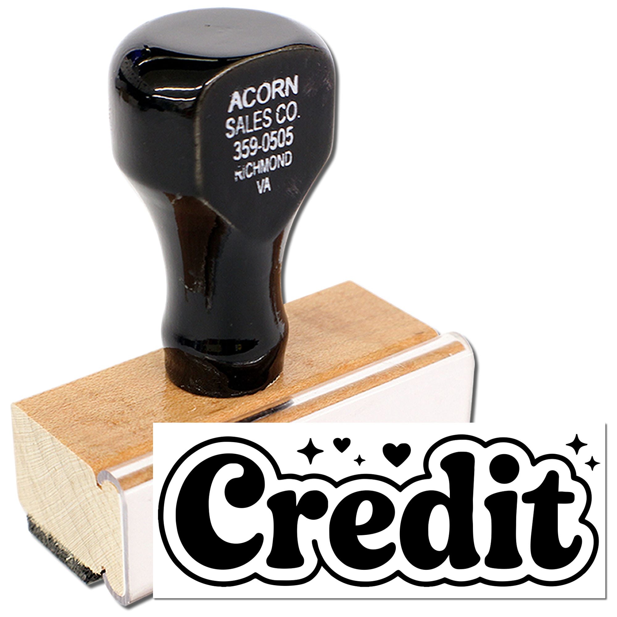 Custom credit rubber stamp with wooden handle for marking paid invoices and business documents.