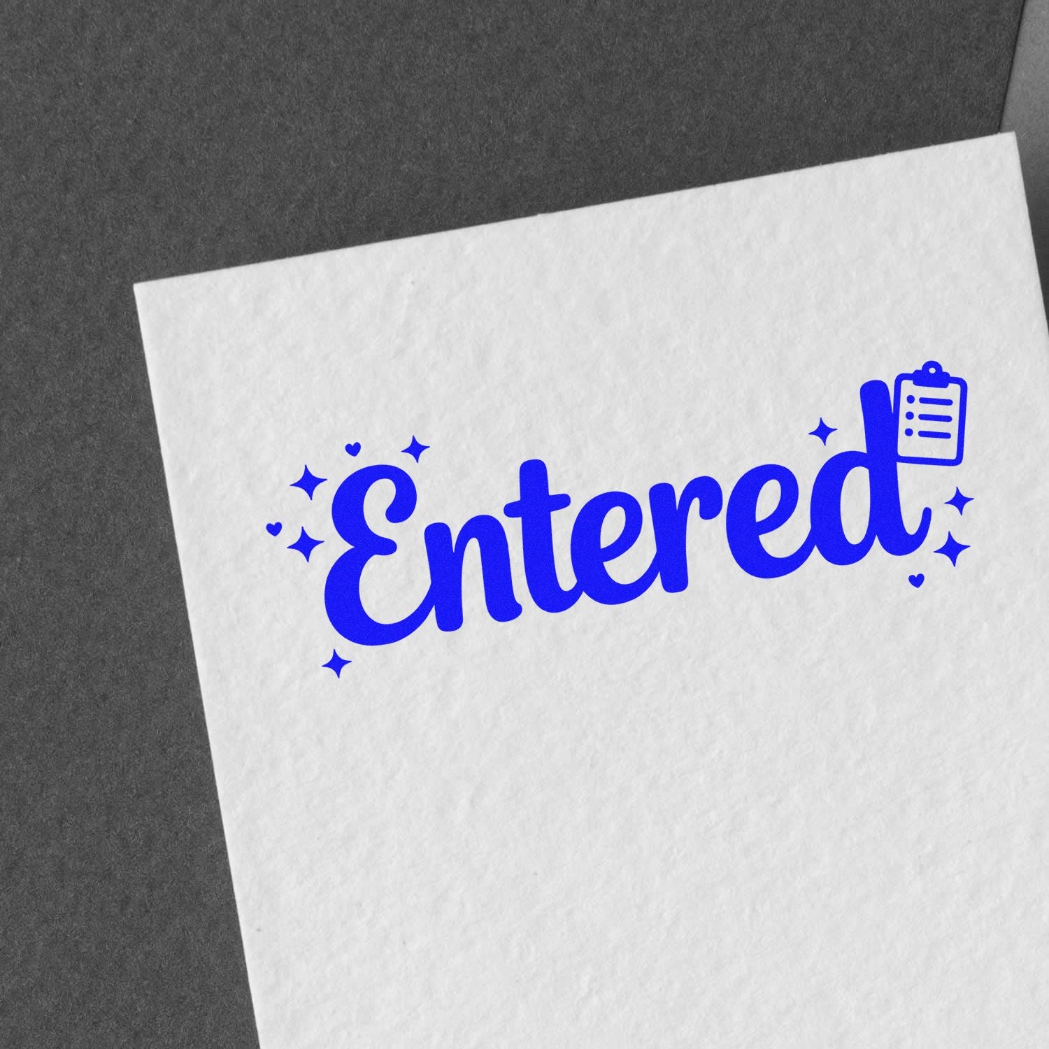 Blue Entered rubber stamp impression on paper with clipboard icon for office document processing and filing.