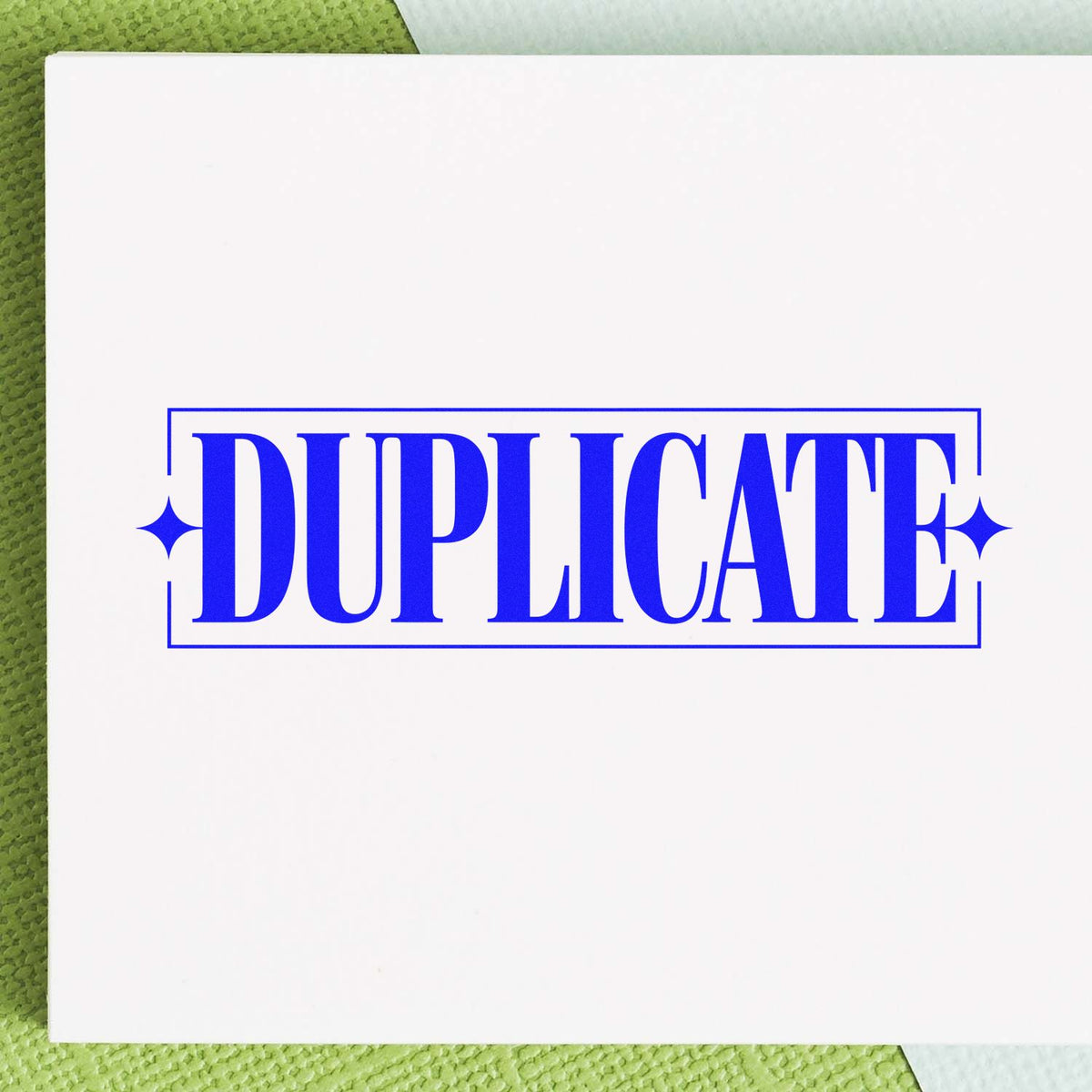 Blue DUPLICATE rubber stamp on paper, used to mark document copies.