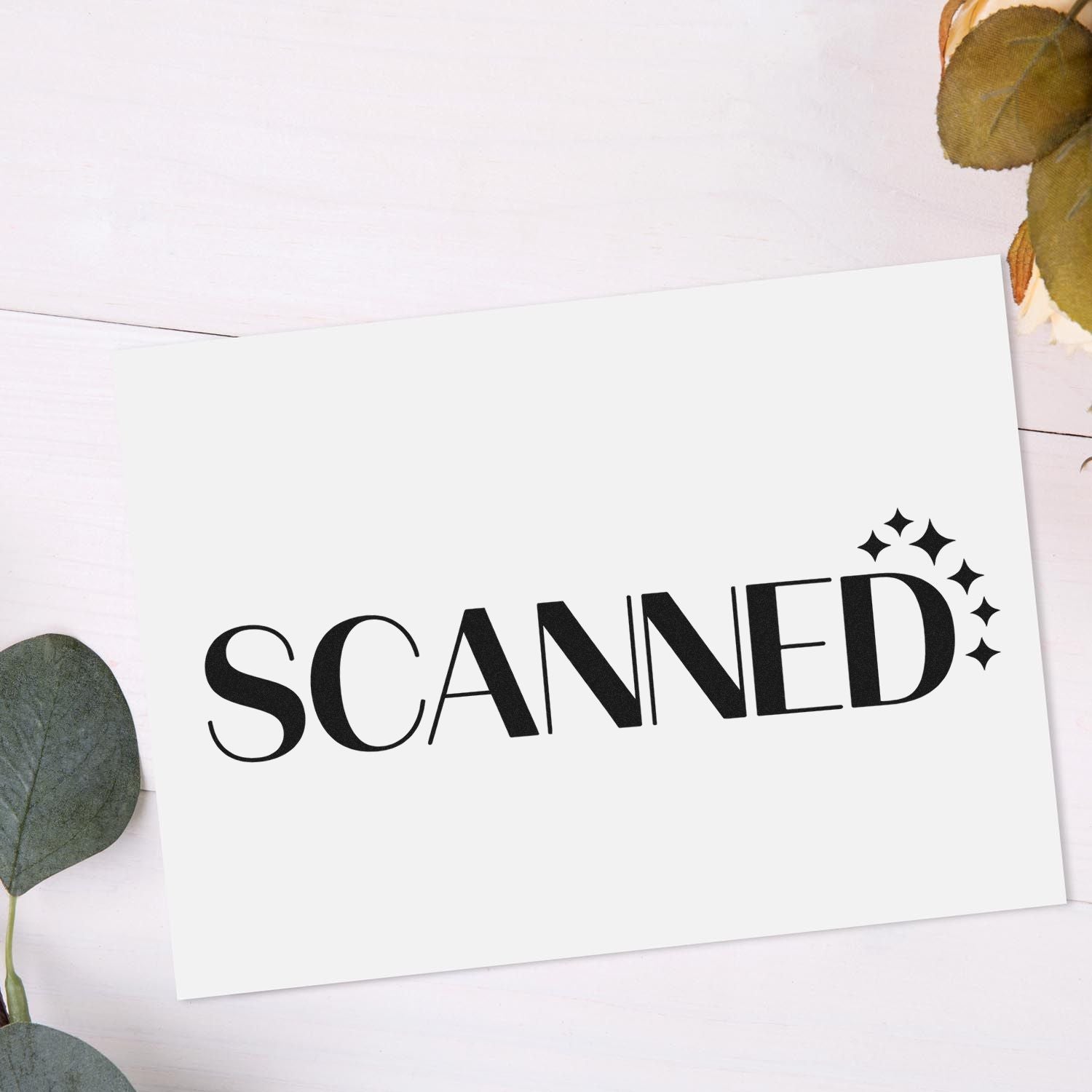 Scanned rubber stamp on white paper, marking documents as digitally scanned for office and record-keeping use.