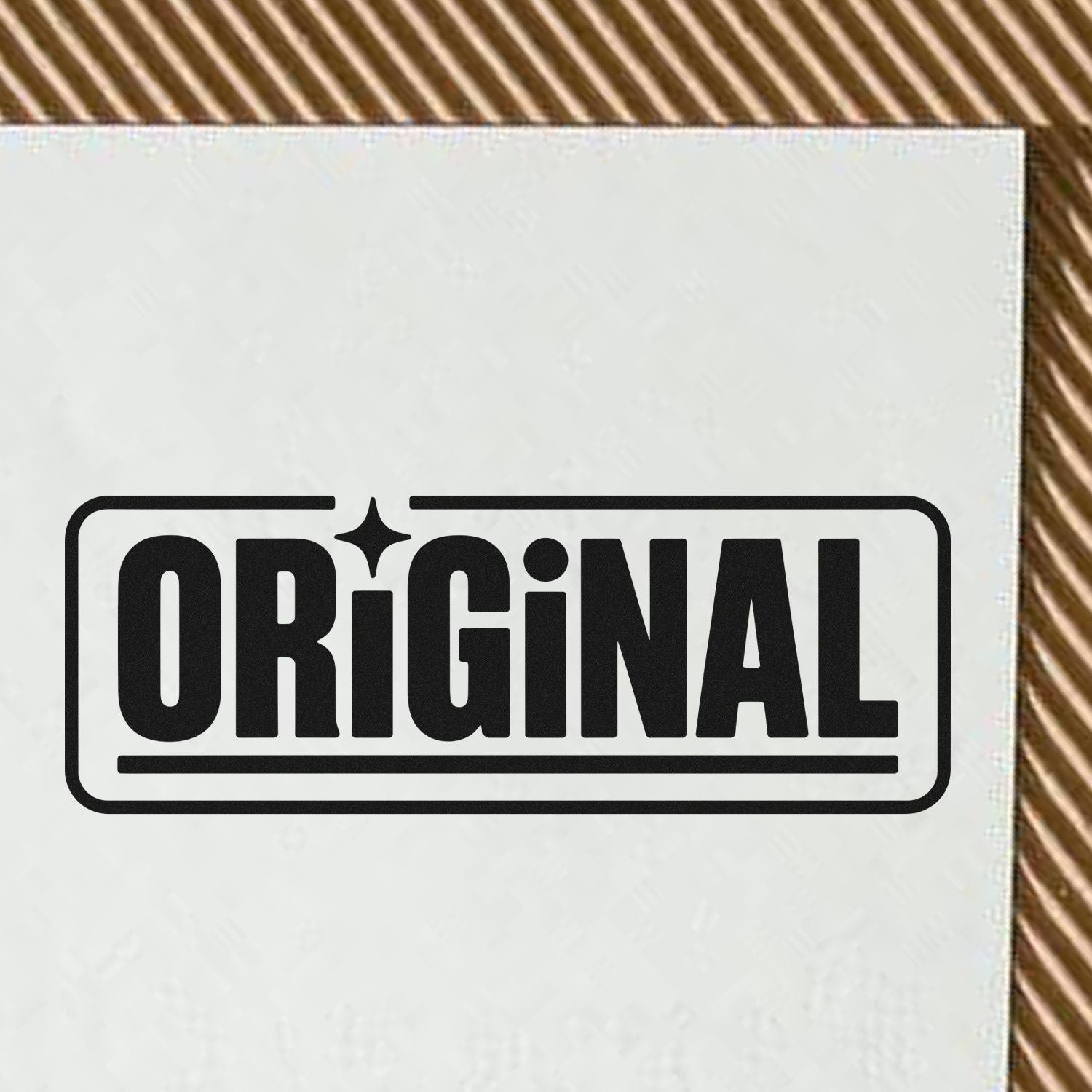 Original rubber stamp impression on paper, bold black bordered label for authentic handmade branding.