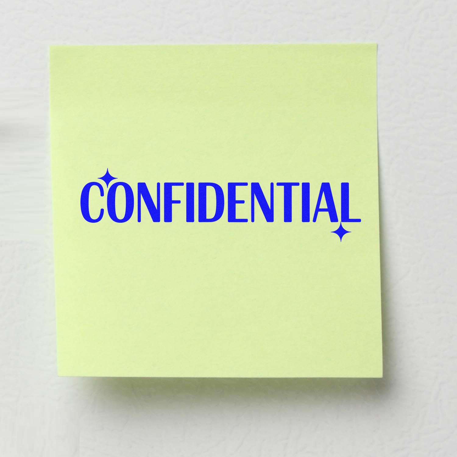 Blue confidential rubber stamp impression on a sticky note for marking private documents and office mail.