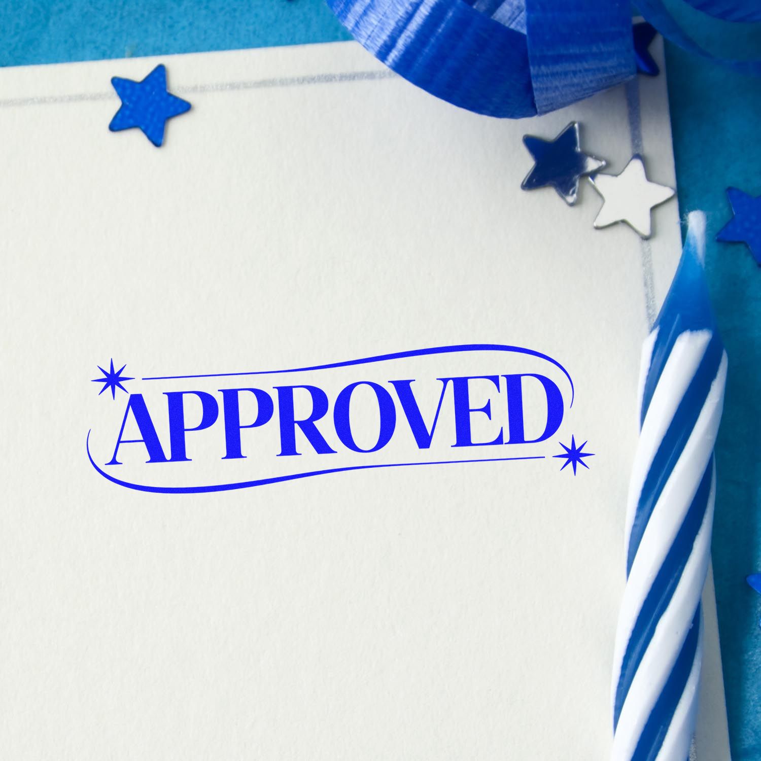 Blue APPROVED rubber stamp imprint on paper with stars and ribbon, ideal for document approval and office use.