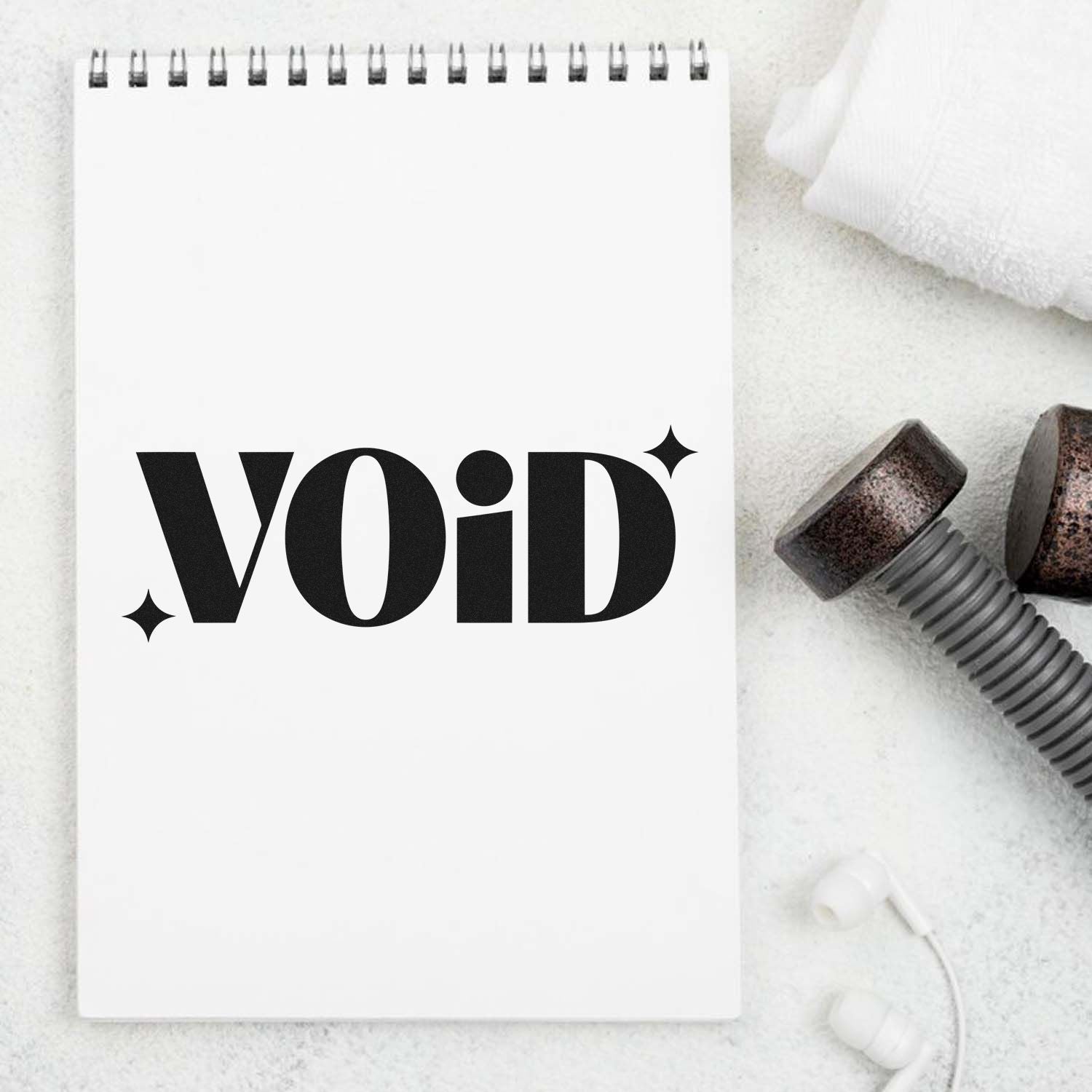 VOID rubber stamp mockup on notebook with ink stamp tools, ideal for custom office branding