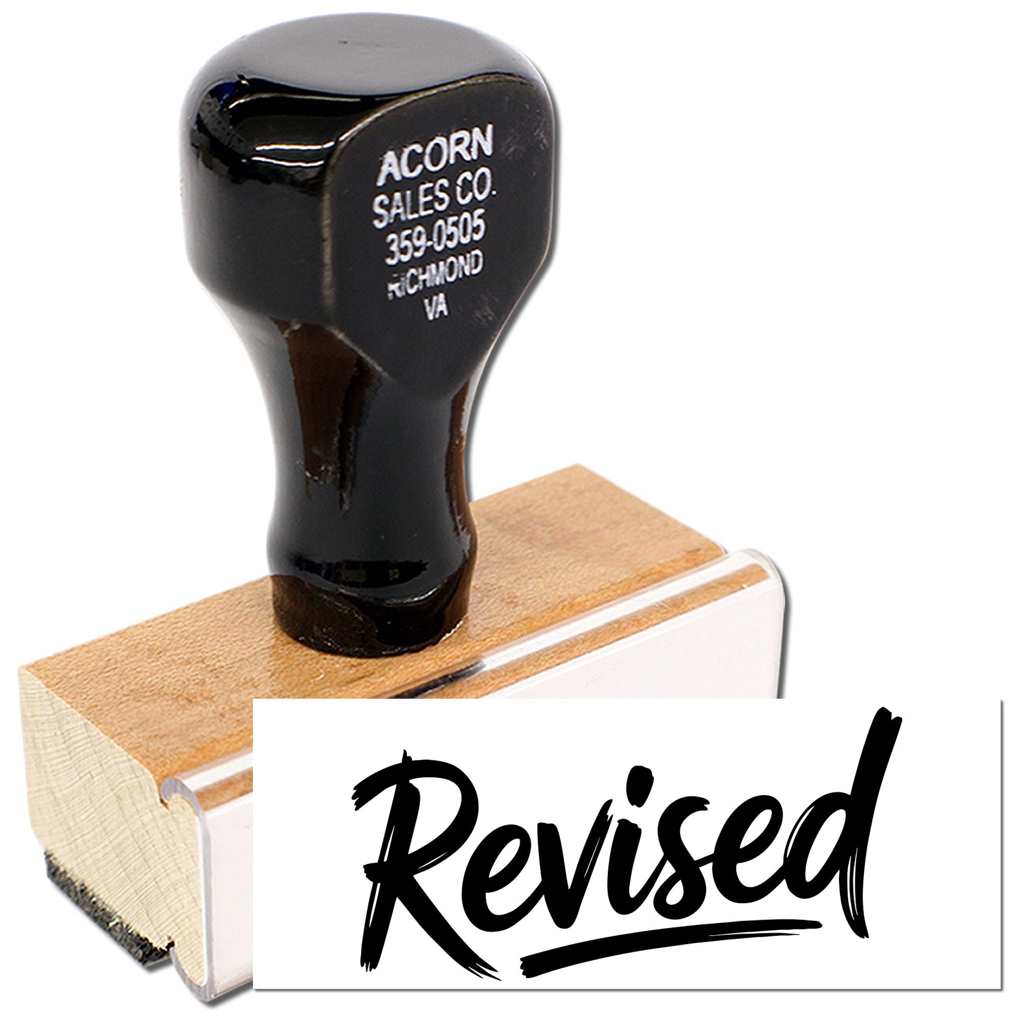 Custom rubber stamp with Revised imprint and company address for office paperwork and mailings.