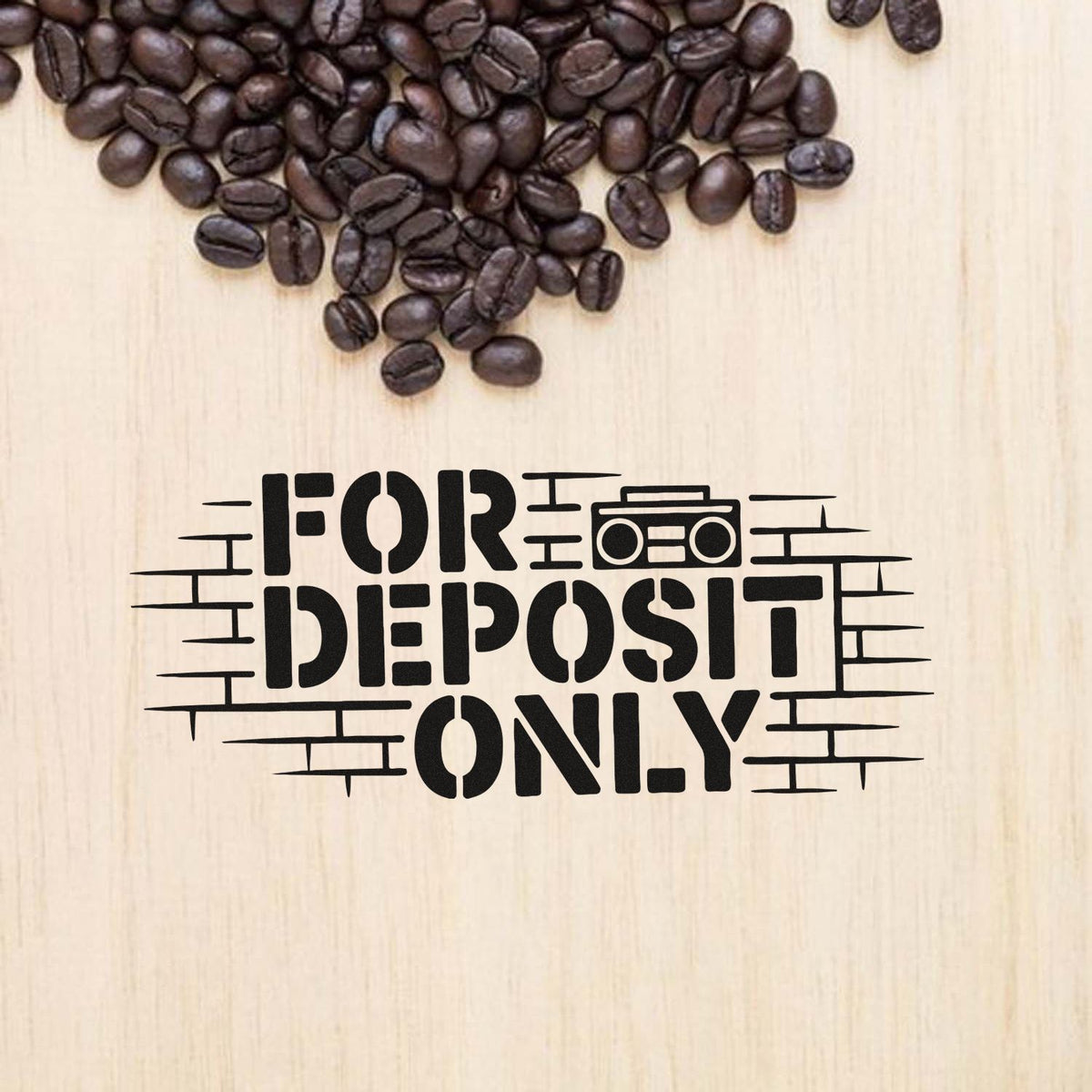 Custom For Deposit Only rubber stamp design for endorsing business checks, shown on a wood background with coffee beans.