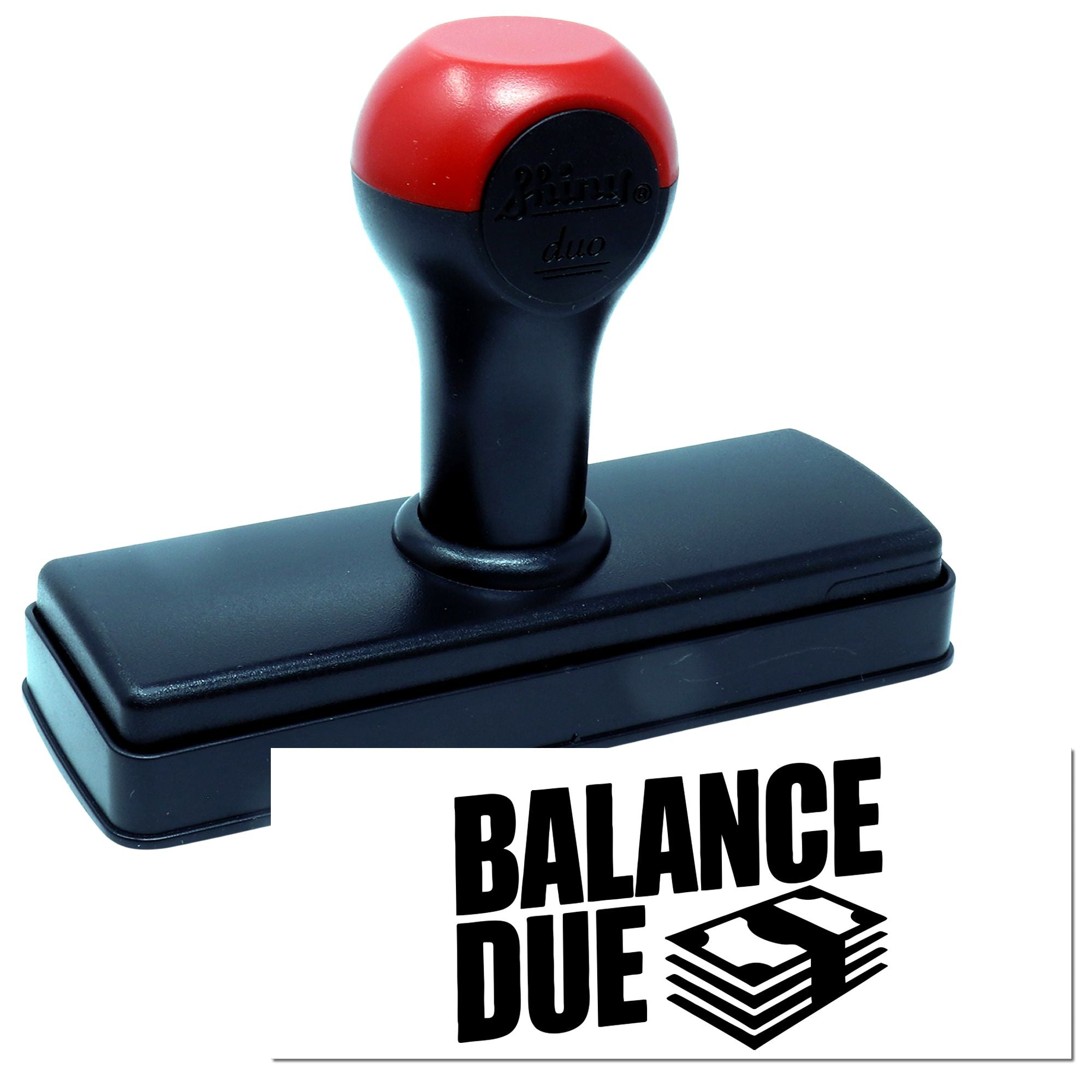 Self-inking rubber stamp with BALANCE DUE imprint for invoices, accounting, and payment reminder marking.