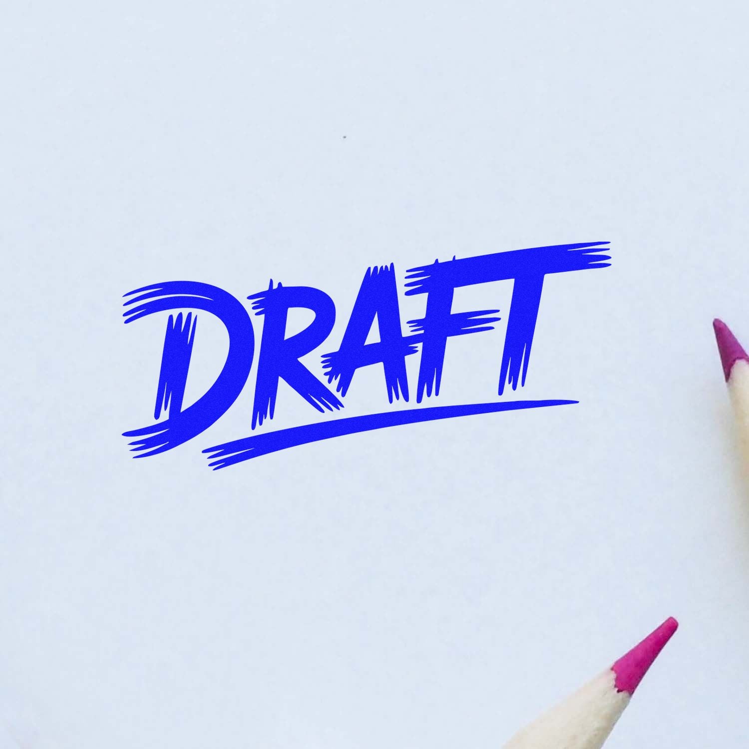 Blue DRAFT rubber stamp impression on white paper, used to mark draft documents and review copies.