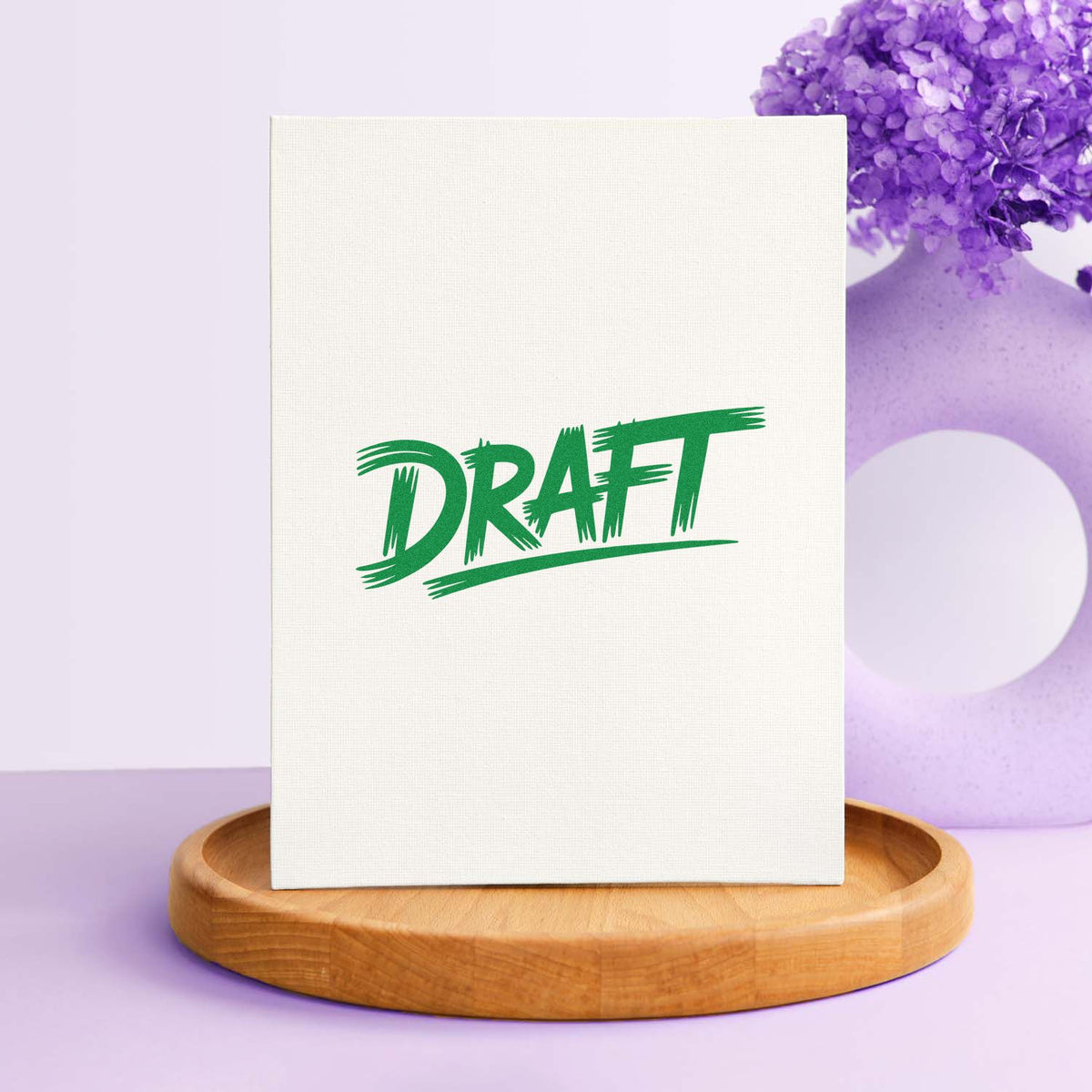 Draft rubber stamp design with green brush lettering on a white canvas mockup, ideal for custom office approval stamps.