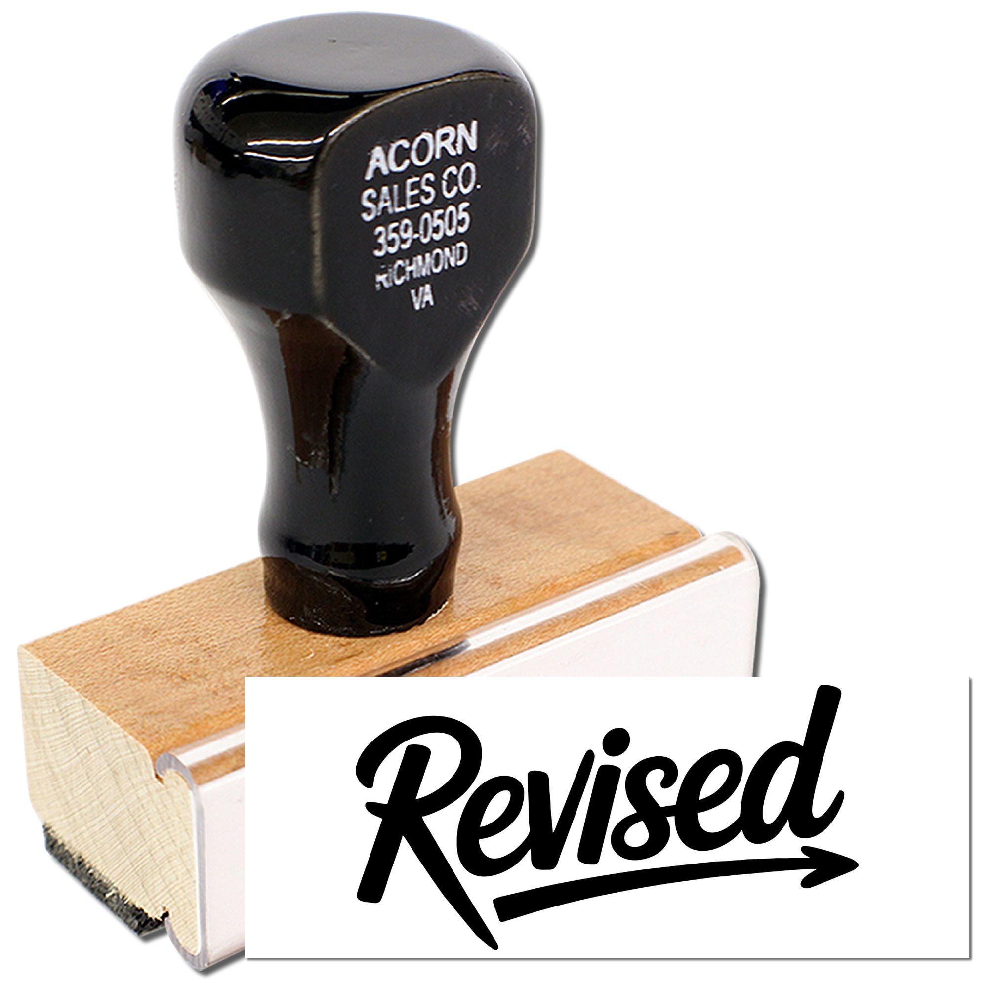 Revised rubber stamp with custom business imprint, shown on a wooden handle for office document approval.