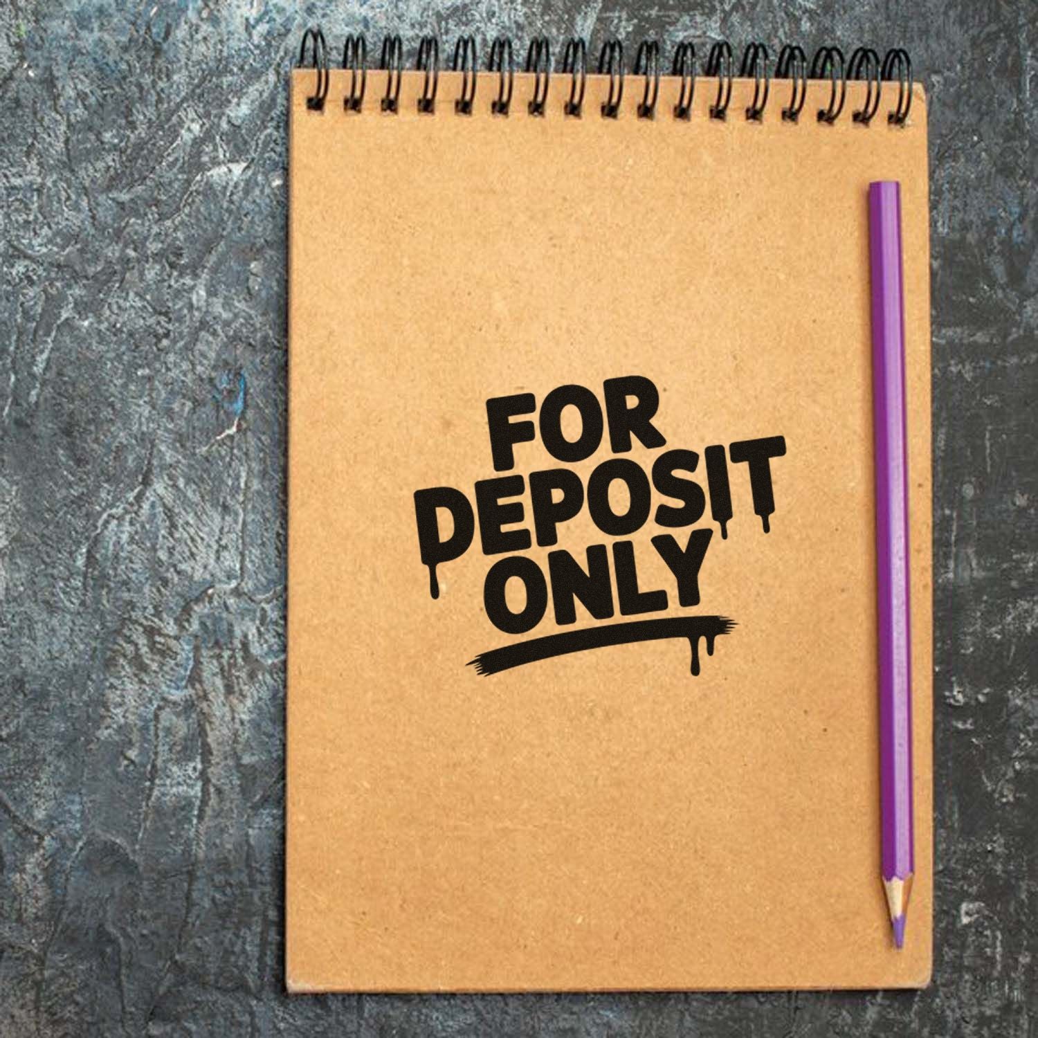 For Deposit Only rubber stamp on notebook, ideal for secure check endorsement and business banking use.