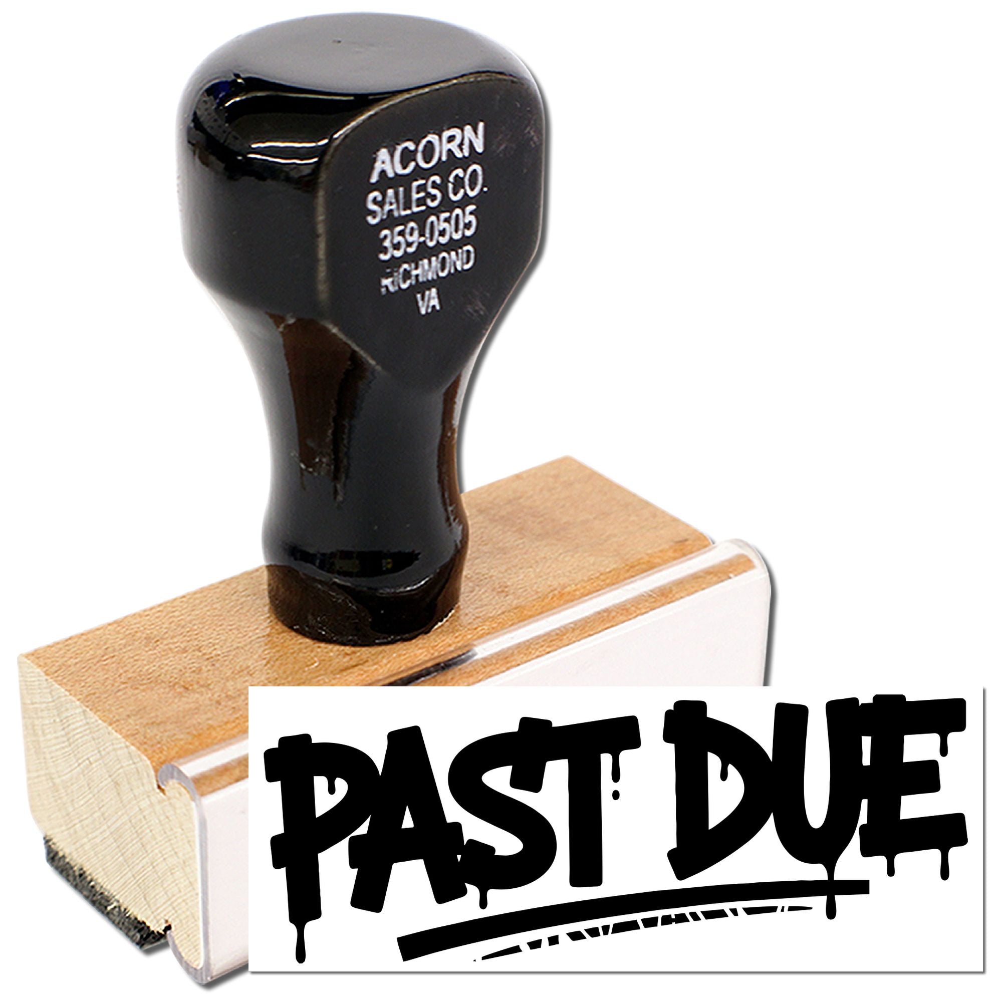 Past Due rubber stamp on a wooden block for office billing and overdue payment notices.