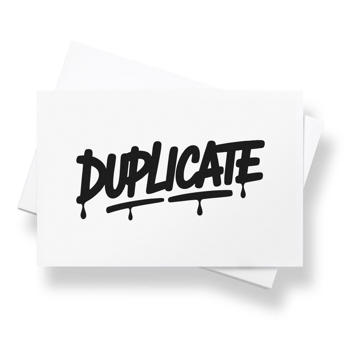 Duplicate rubber stamp design with bold black dripping text on white paper cards.