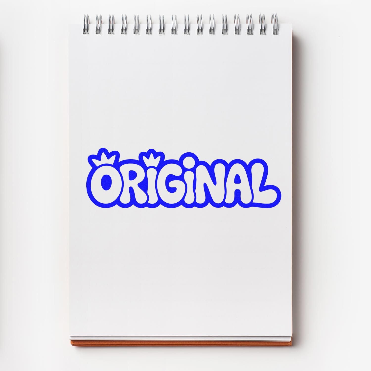 Original blue rubber stamp design on a spiral notebook page, ideal for custom branding, packaging, and stationery.