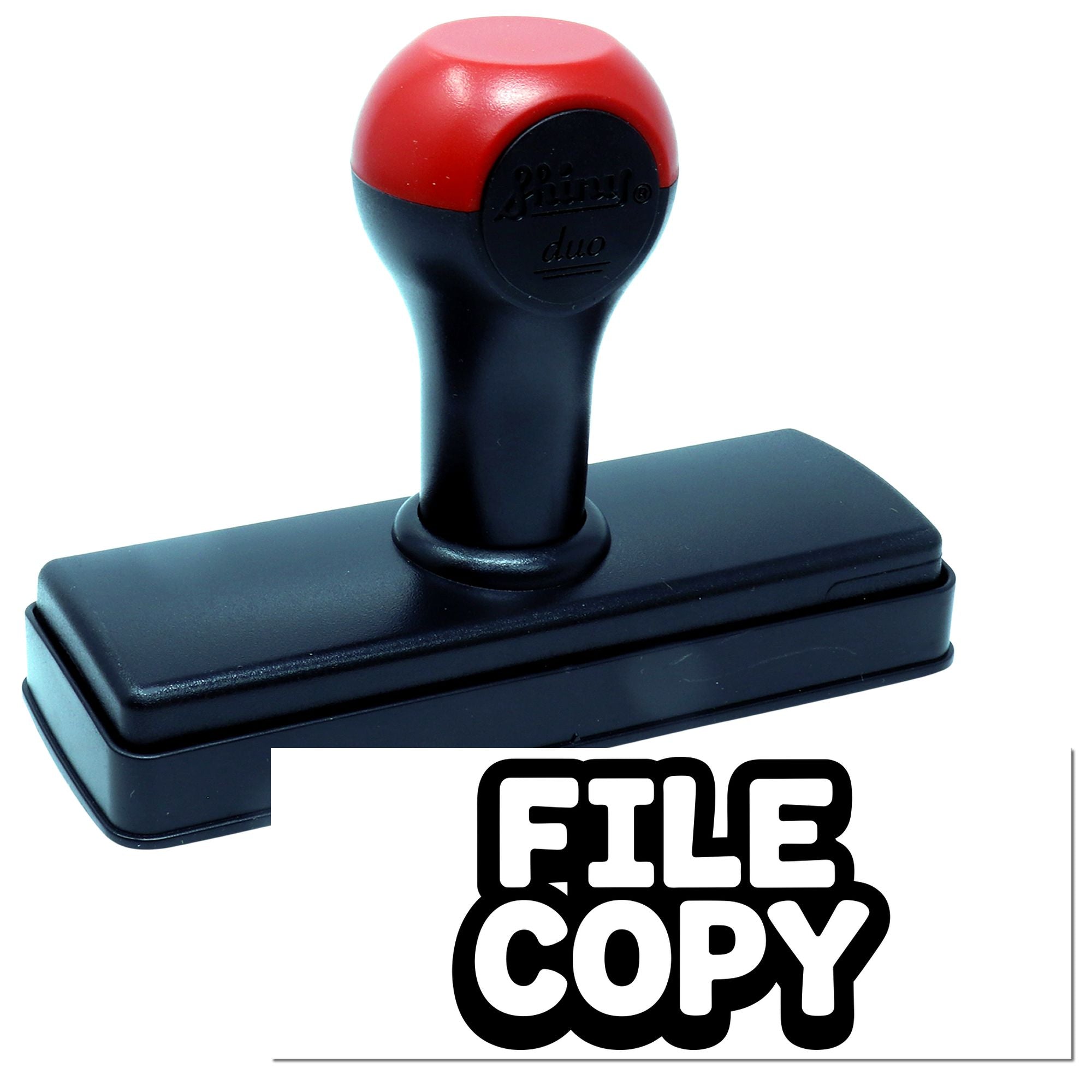 Self-inking FILE COPY rubber stamp with red and black handle for office document marking.