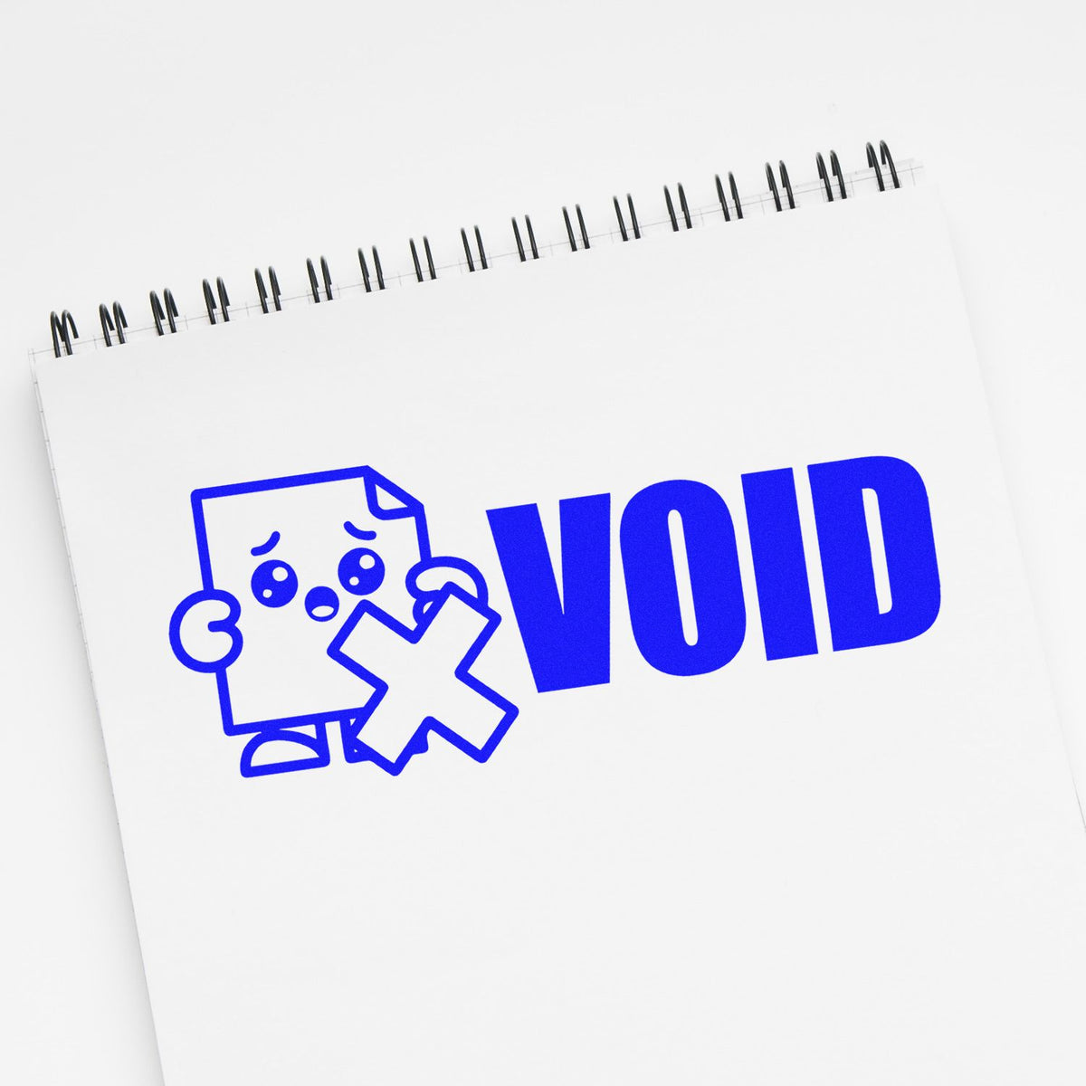 Void rubber stamp design with sad document icon on notebook page, ideal for canceled forms and office paperwork.