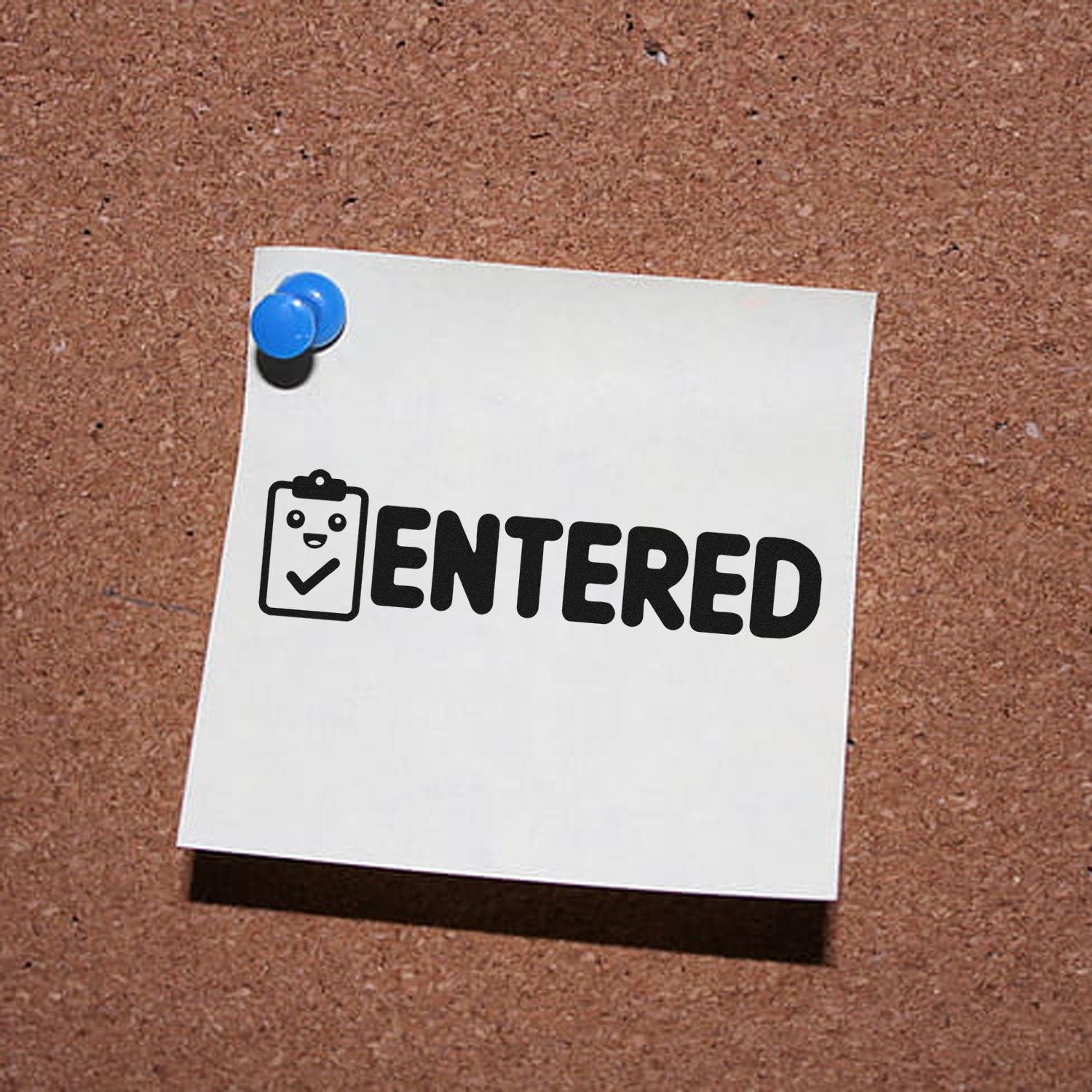 Entered rubber stamp on pinned note, ideal for office records, inventory tracking, and document approval.