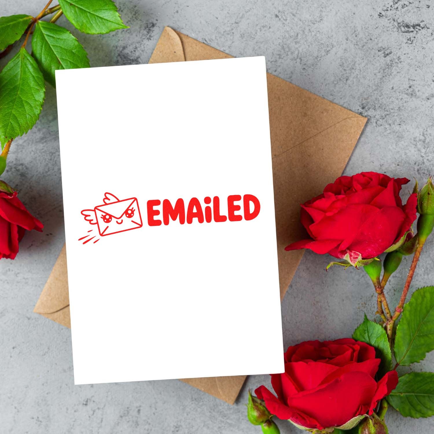 Red Emailed rubber stamp on a blank card mockup with envelope and roses for office, mail, or stationery use.
