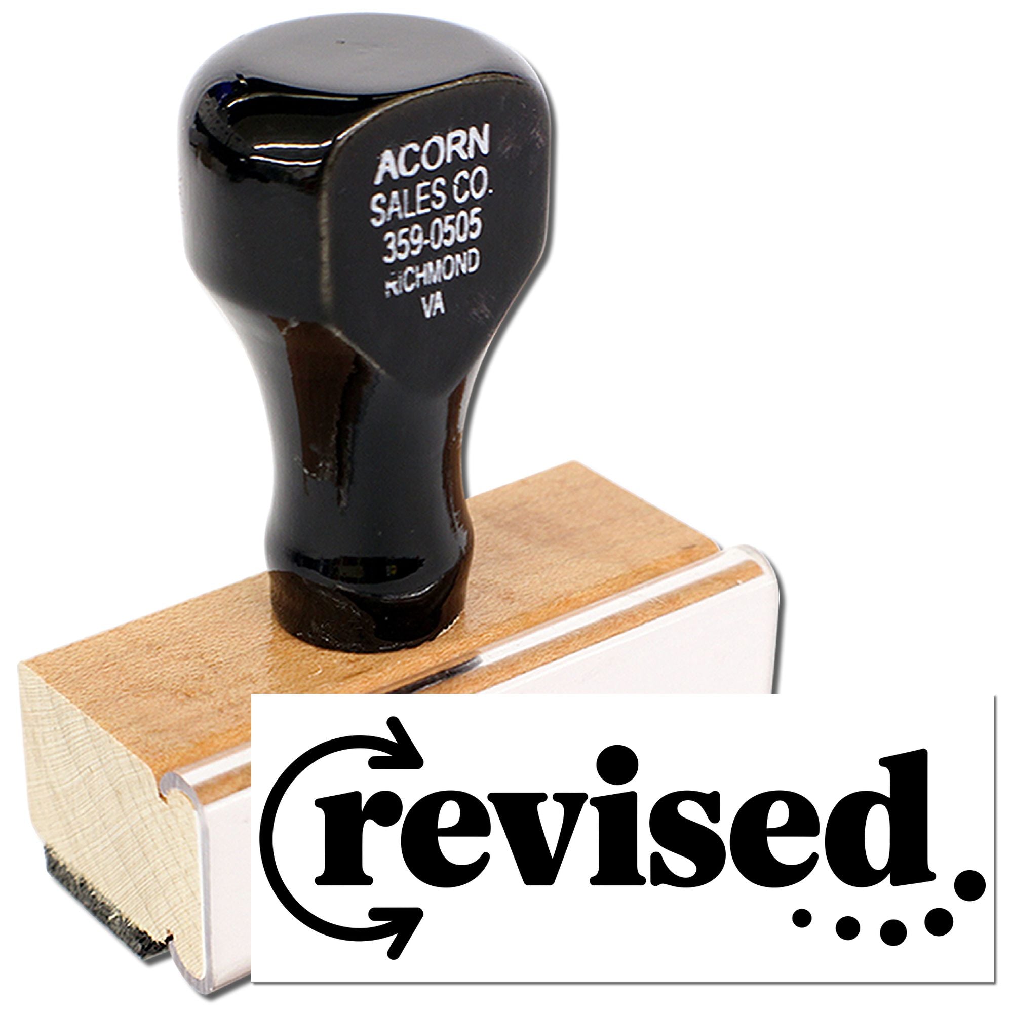 Revised rubber stamp with wooden handle for document review, featuring bold custom imprint for office paperwork.