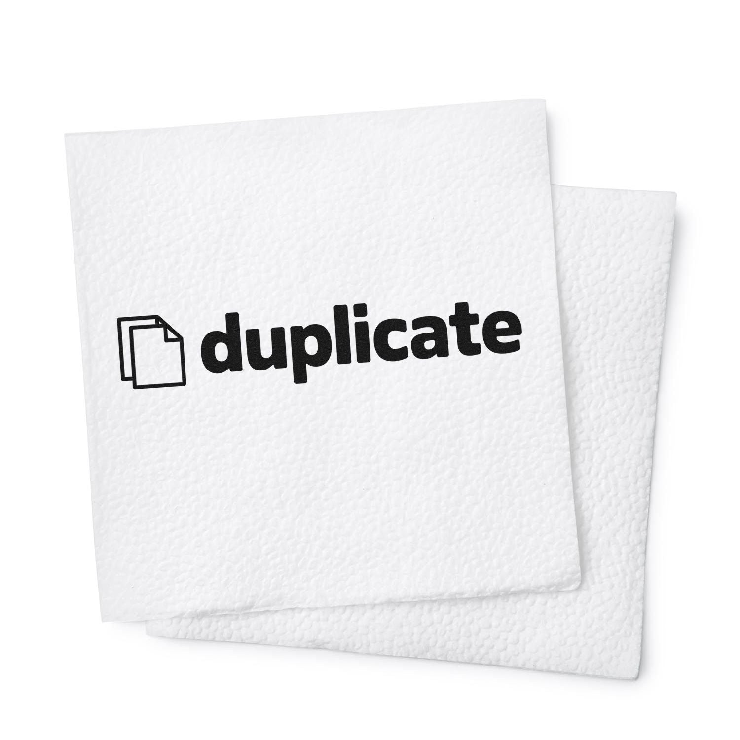 Duplicate rubber stamp imprint on paper for office document copying, records, and file management.