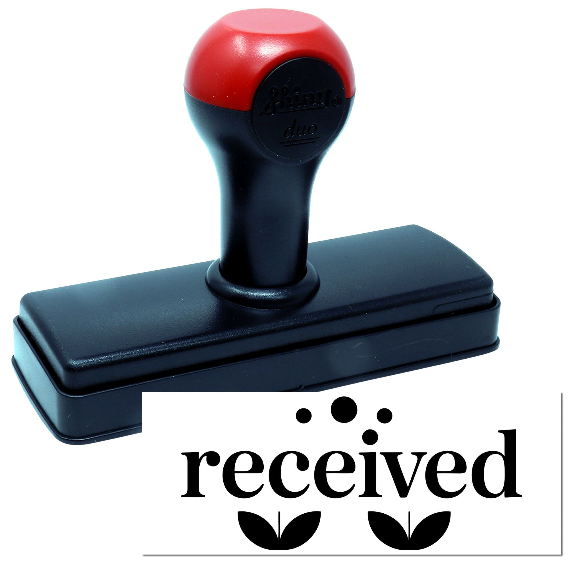 Self-inking received rubber stamp with black imprint for office document processing.