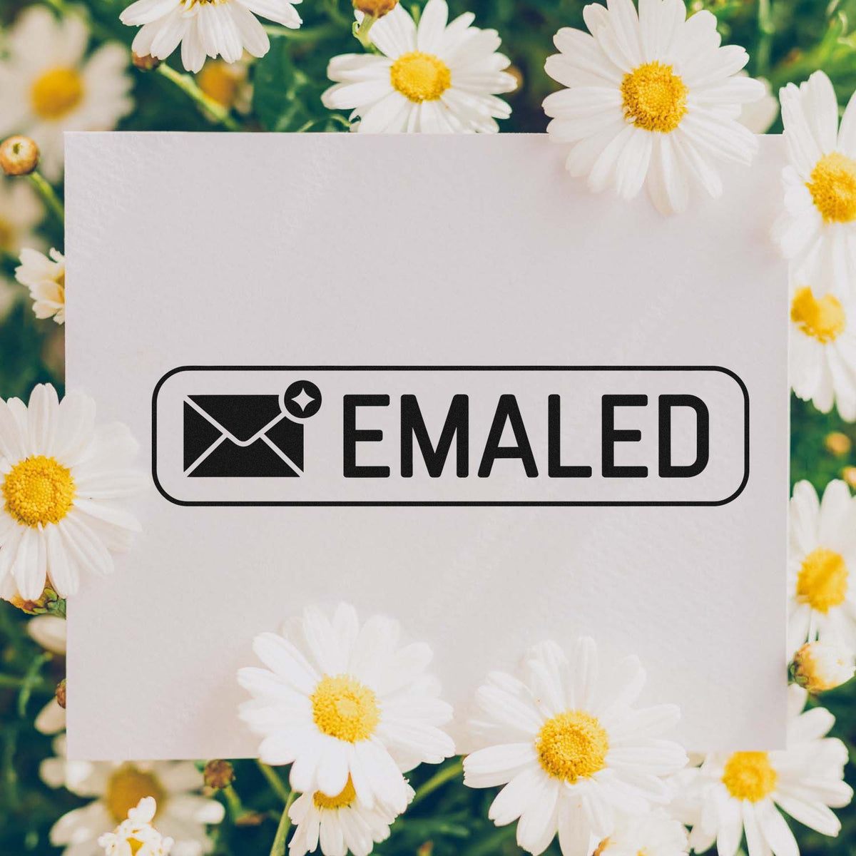 Custom emailed rubber stamp design with envelope icon for office mail and document processing.