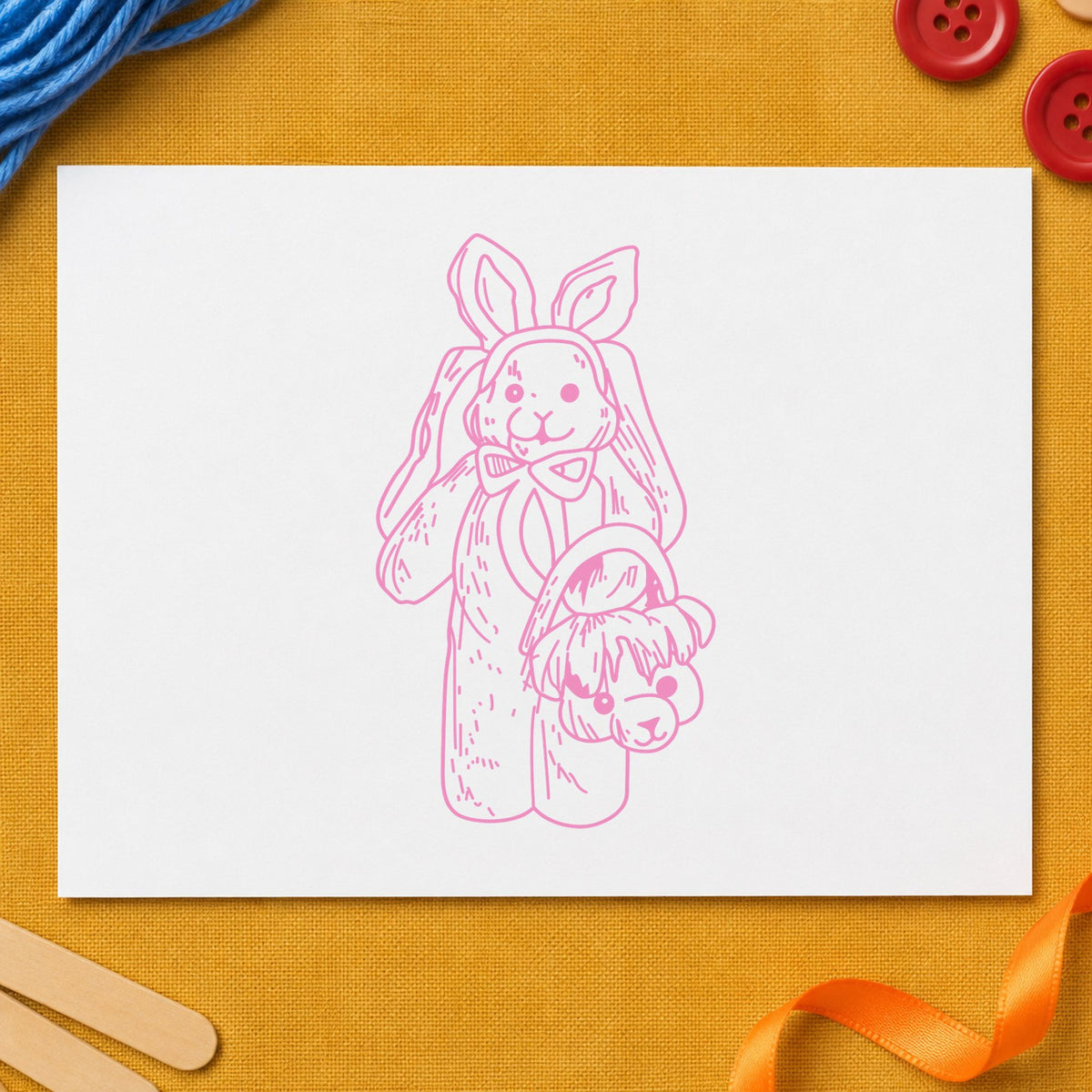 Bunny with Bear Shaped Basket Rubber Stamp impression in pink ink on white paper in a styled craft setting.
