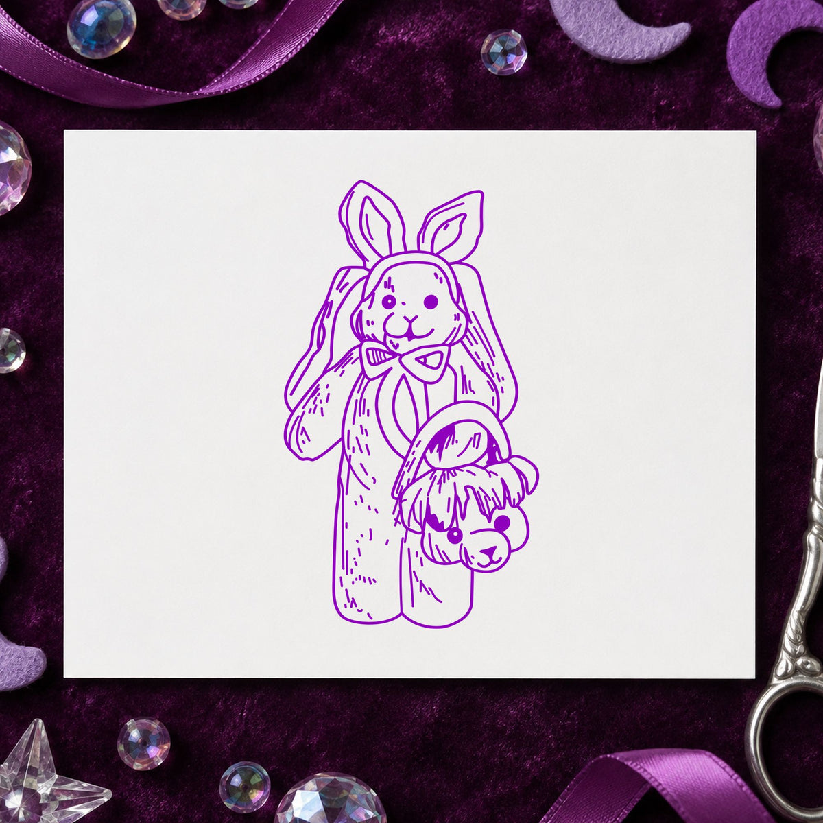 Bunny with Bear Shaped Basket Rubber Stamp impression in purple ink on white paper in a styled craft setting.